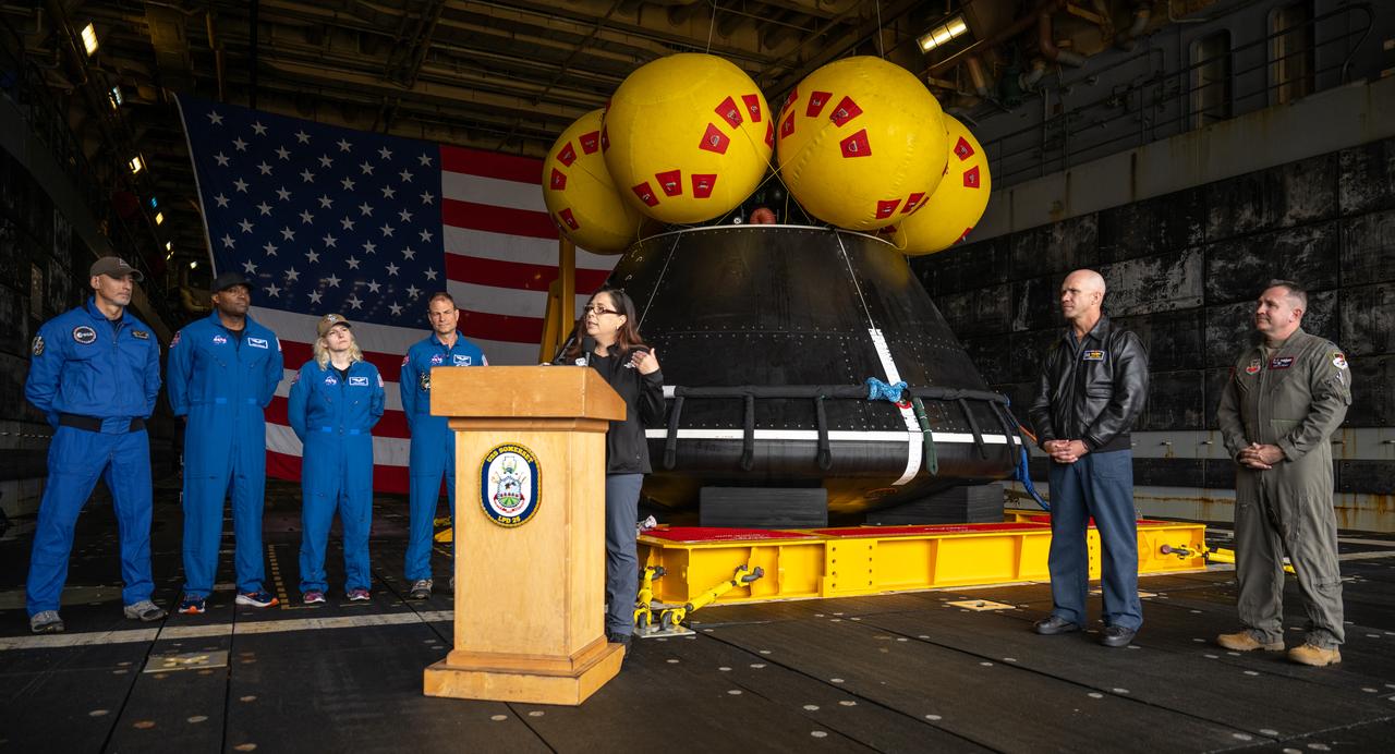 Liliana Villarreal, NASA’s Artemis II landing and recovery director, Exploration Ground Systems Program, gives remarks during a media event where NASA and the Department of Defense discussed the recovery operations that will bring the Artemis II astronauts and the agency’s Orion spacecraft home at the conclusion of next year’s mission around the Moon, Monday, March 31, 2025, onboard USS Somerset at Naval Base San Diego, in California. The teams spent the week practicing the procedures they will use to recover the astronauts after their more than 600,000 mile journey from Earth to the Moon and back on the first crewed mission under the Artemis campaign. Photo Credit: (NASA/Bill Ingalls)
