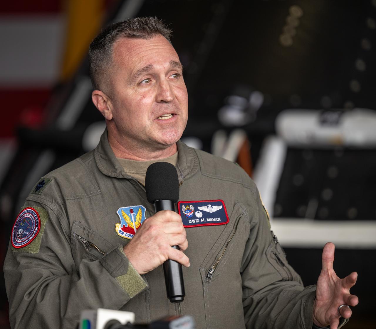 Lt. Col. David Mahan, commander, U.S. Air Force’s 1st Air Force, Detachment 3, Patrick Space Force Base, Florida, gives remarks during a media event where NASA and the Department of Defense discussed the recovery operations that will bring the Artemis II astronauts and the agency’s Orion spacecraft home at the conclusion of next year’s mission around the Moon, Monday, March 31, 2025, onboard USS Somerset at Naval Base San Diego, in California. The teams spent the week practicing the procedures they will use to recover the astronauts after their more than 600,000 mile journey from Earth to the Moon and back on the first crewed mission under the Artemis campaign. Photo Credit: (NASA/Bill Ingalls)