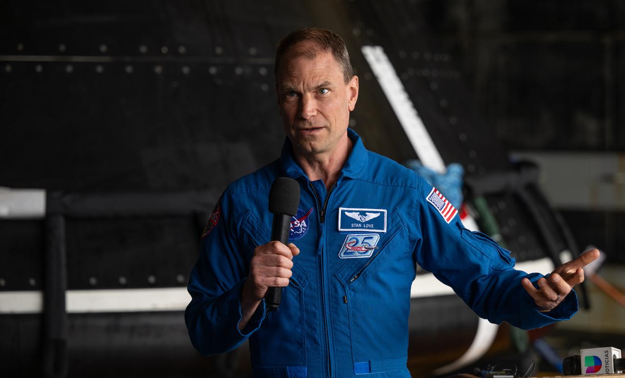 NASA astronaut Stan Love gives remarks during a media event where NASA and the Department of Defense discussed the recovery operations that will bring the Artemis II astronauts and the agency’s Orion spacecraft home at the conclusion of next year’s mission around the Moon, Monday, March 31, 2025, onboard USS Somerset at Naval Base San Diego, in California. The teams spent the week practicing the procedures they will use to recover the astronauts after their more than 600,000 mile journey from Earth to the Moon and back on the first crewed mission under the Artemis campaign. Photo Credit: (NASA/Bill Ingalls)