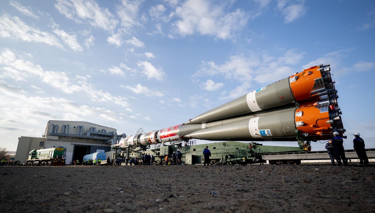 The Soyuz rocket is rolled out by train to the launch pad at Site 31, Saturday, April 5, 2025, at the Baikonur Cosmodrome in Kazakhstan. Expedition 73 crewmembers: NASA astronaut Jonny Kim, and Roscosmos cosmonauts Sergey Ryzhikov and Alexey Zubritskiy, are scheduled to launch aboard their Soyuz MS-27 spacecraft on April 8. Photo Credit: (NASA/Joel Kowsky)