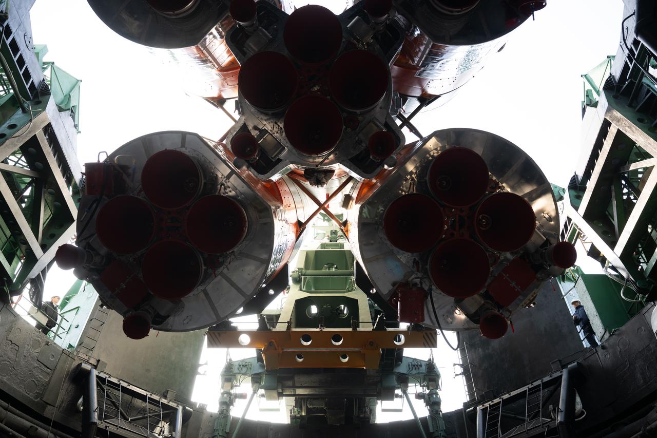 The Soyuz rocket is seen as it is raised into the vertical position at the launch pad at Site 31, Saturday, April 5, 2025, at the Baikonur Cosmodrome in Kazakhstan. Expedition 73 crewmembers: NASA astronaut Jonny Kim, and Roscosmos cosmonauts Sergey Ryzhikov and Alexey Zubritskiy, are scheduled to launch aboard their Soyuz MS-27 spacecraft on April 8. Photo Credit: (NASA/Joel Kowsky)