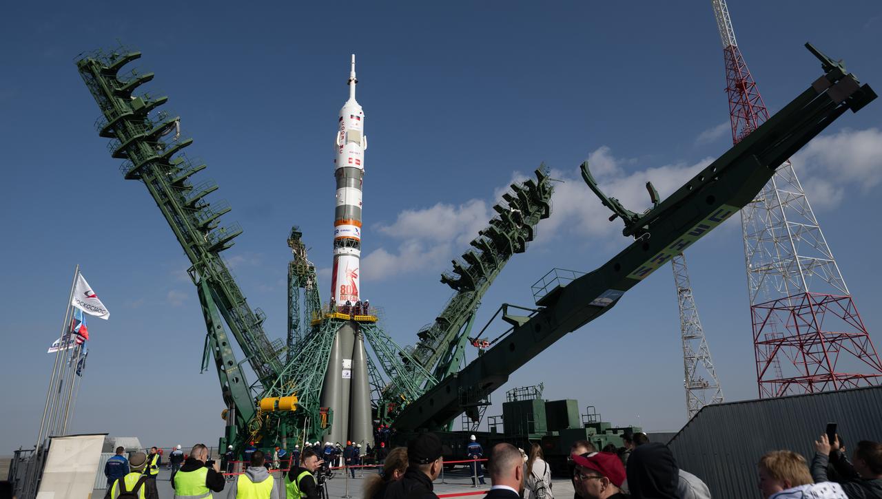 The Soyuz rocket is seen as the service structure is closed around it at the launch pad at Site 31, Saturday, April 5, 2025, at the Baikonur Cosmodrome in Kazakhstan. Expedition 73 crewmembers: NASA astronaut Jonny Kim, and Roscosmos cosmonauts Sergey Ryzhikov and Alexey Zubritskiy, are scheduled to launch aboard their Soyuz MS-27 spacecraft on April 8. Photo Credit: (NASA/Joel Kowsky)