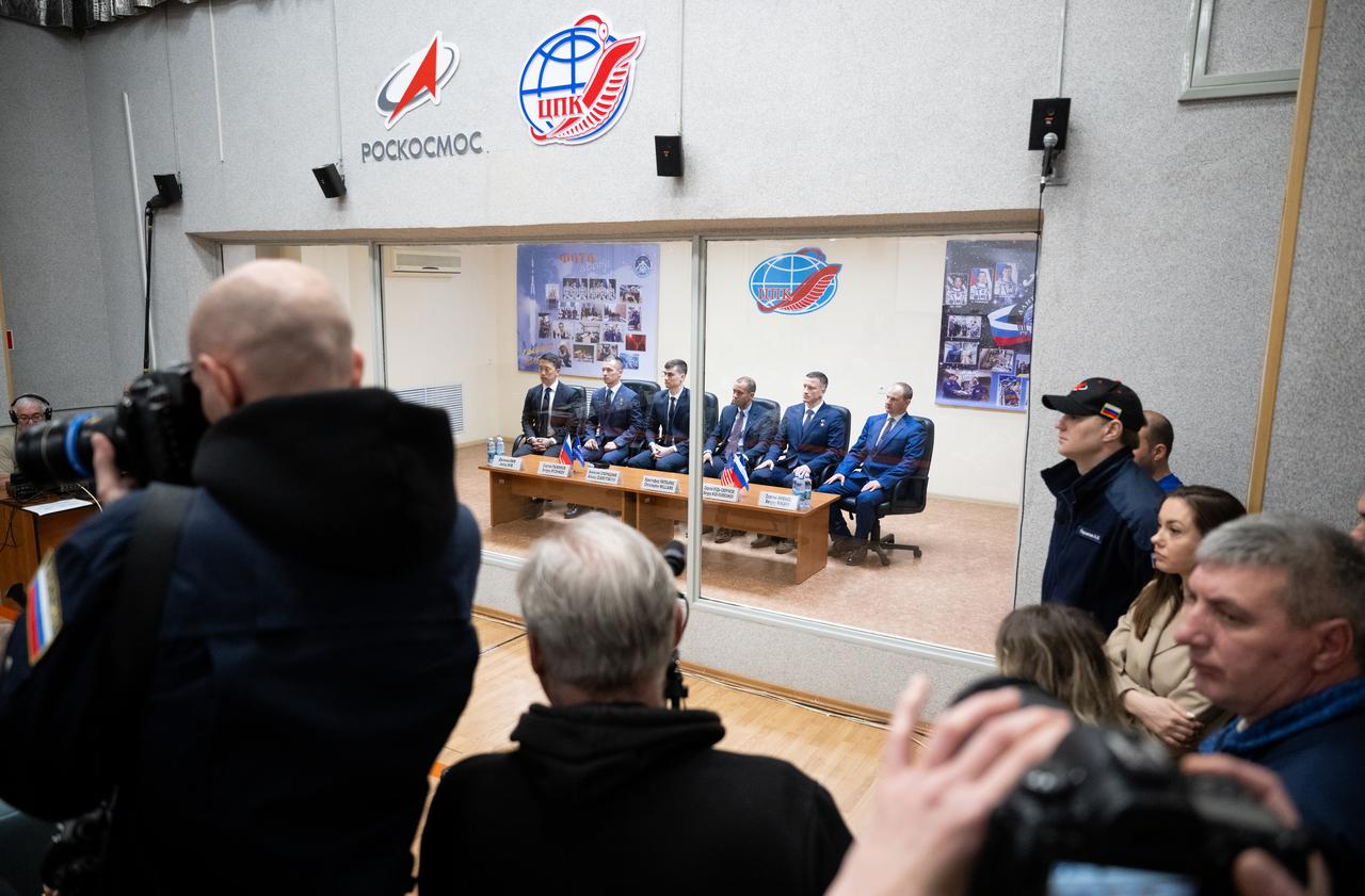Expedition 73 crewmembers NASA astronaut Jonny Kim, left, and Roscosmos cosmonauts Sergey Ryzhikov and Alexey Zubritskiy and backup crewmembers Chris Williams of NASA, Sergey Kud-Skverchkov, and Sergey Mikaev of Roscosmos are seen during the State Commission meeting to approve the Soyuz launch of Expedition 73 to the International Space Station, Monday, April 7, 2025, at the Cosmonaut Hotel in Baikonur, Kazakhstan. Kim, Ryzhikov, Zubritskiy are scheduled to launch aboard their Soyuz MS-27 spacecraft on April 8. Photo Credit: (NASA/Joel Kowsky)