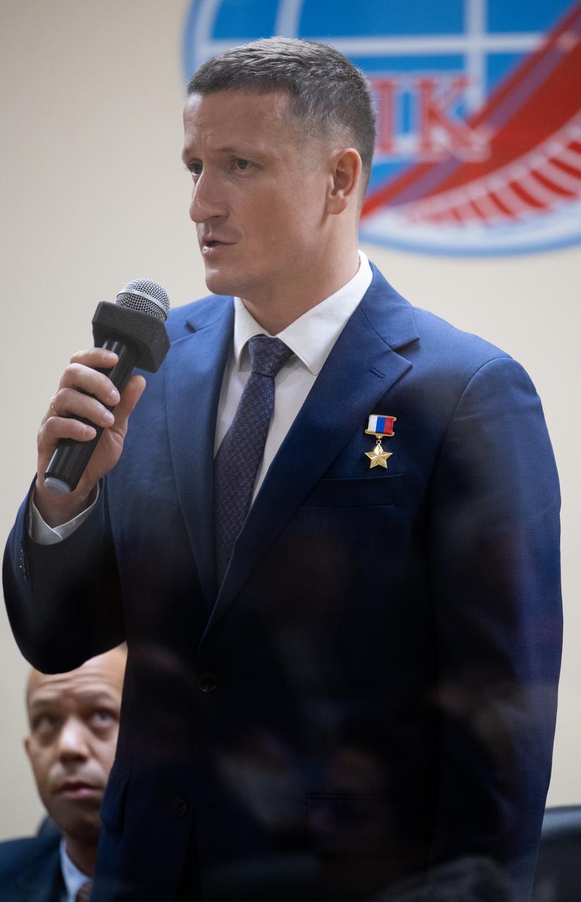 Expedition 73 backup crewmember Sergey Kud-Skverchkov of Roscosmos is seen during the State Commission meeting to approve the Soyuz launch of Expedition 73 to the International Space Station, Monday, April 7, 2025, at the Cosmonaut Hotel in Baikonur, Kazakhstan. Expedition 73 crew members: NASA astronaut Jonny Kim, and Roscosmos cosmonauts Sergey Ryzhikov and Alexey Zubritskiy, are scheduled to launch aboard their Soyuz MS-27 spacecraft on April 8. Photo Credit: (NASA/Joel Kowsky)