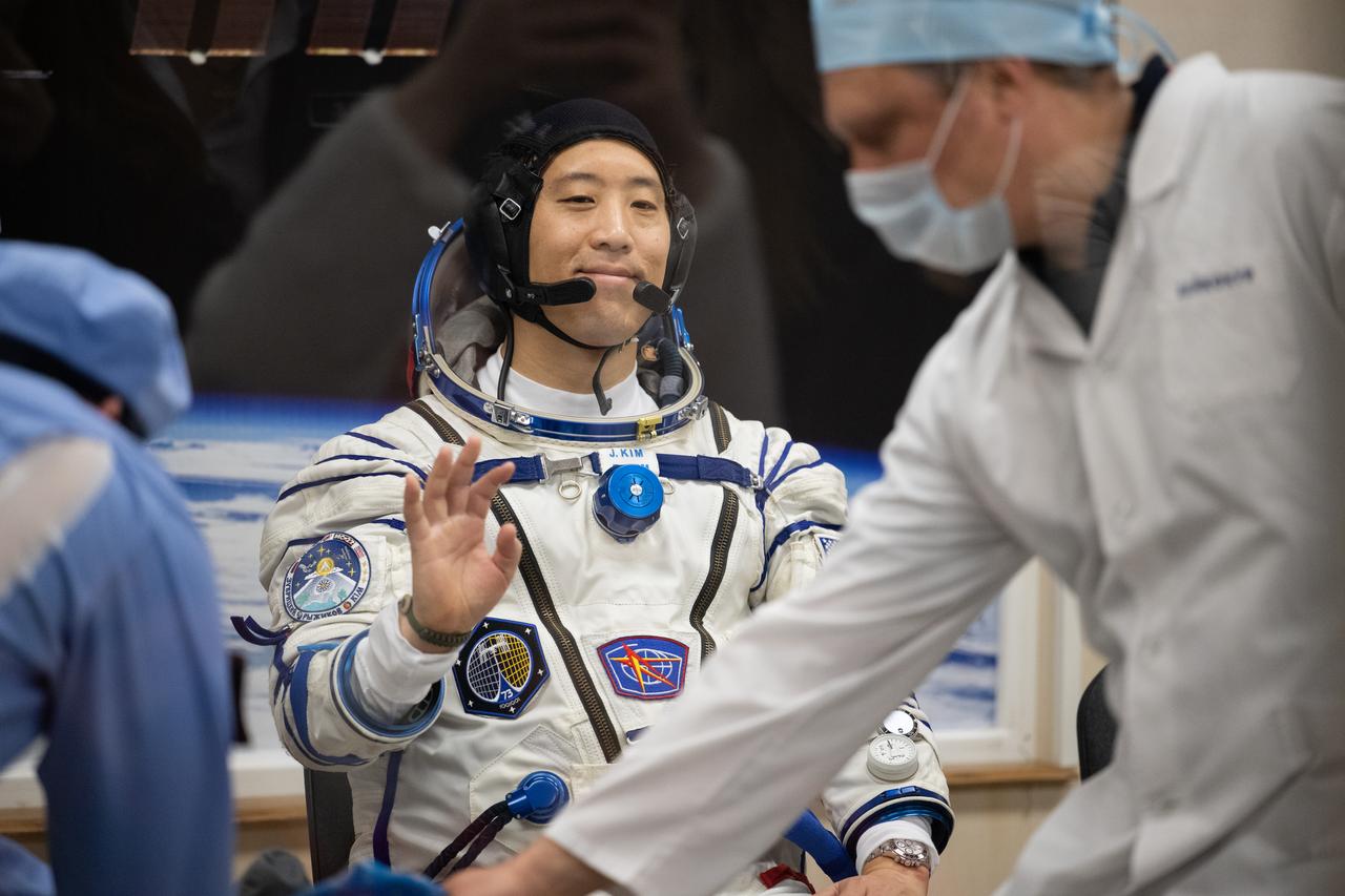 NASA astronaut Jonny Kim is seen as he prepares to have his Russian Sokol suit pressure checked as he and fellow crewmates, Roscosmos cosmonauts Sergey Ryzhikov and Alexey Zubritskiy prepare for their Soyuz launch to the International Space Station Tuesday, April 8, 2025 (April 7 Eastern Time), in Baikonur, Kazakhstan. The launch will send Kim, Ryzhikov, Zubritskiy on a mission to the International Space Station. Photo Credit: (NASA/Joel Kowsky)