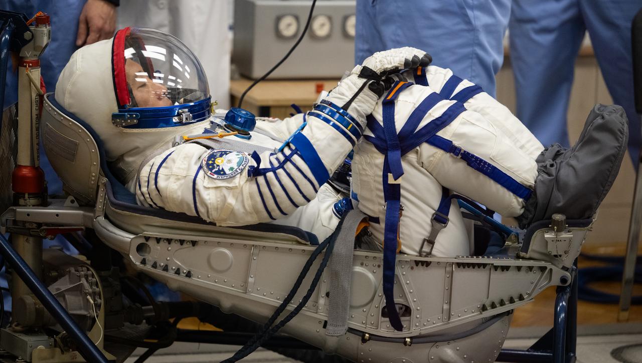 NASA astronaut Jonny Kim has his Russian Sokol suit pressure checked as he and fellow crewmates, Roscosmos cosmonauts Sergey Ryzhikov and Alexey Zubritskiy prepare for their Soyuz launch to the International Space Station Tuesday, April 8, 2025 (April 7 Eastern Time), in Baikonur, Kazakhstan. The launch will send Kim, Ryzhikov, Zubritskiy on a mission to the International Space Station. Photo Credit: (NASA/Joel Kowsky)