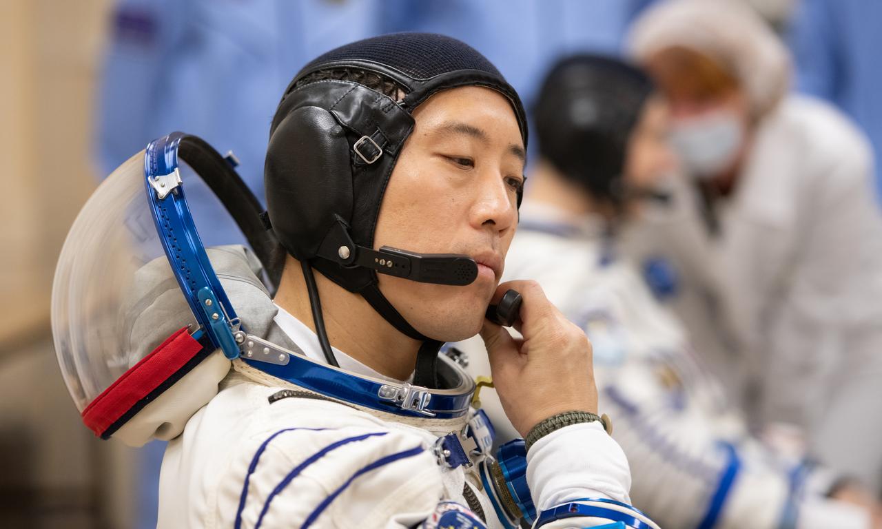 NASA astronaut Jonny Kim is seen after putting on his Russian Sokol suit as he and fellow crewmates, Roscosmos cosmonauts Sergey Ryzhikov and Alexey Zubritskiy prepare for their Soyuz launch to the International Space Station Tuesday, April 8, 2025 (April 7 Eastern Time), in Baikonur, Kazakhstan. The launch will send Kim, Ryzhikov, Zubritskiy on a mission to the International Space Station. Photo Credit: (NASA/GCTC/Pavel Shvets)