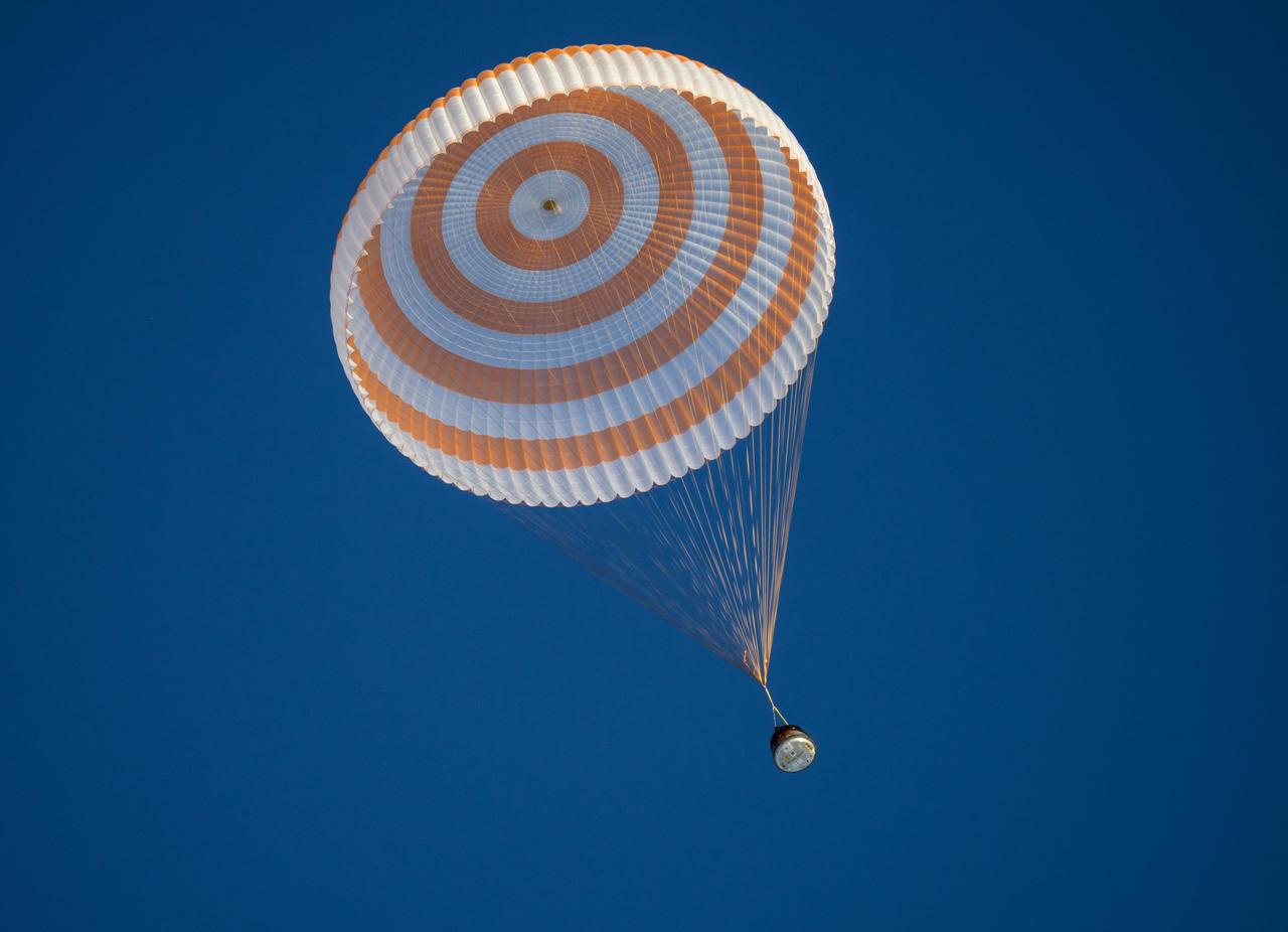 The Soyuz MS-26 spacecraft is seen as it lands in a remote area near the town of Zhezkazgan, Kazakhstan with Expedition 72 NASA astronaut Don Pettit, and Roscosmos cosmonauts Alexey Ovchinin and Ivan Vagner aboard, Sunday, April 20, 2025, (April 19 Eastern). The trio are returning to Earth after logging 220 days in space as a members of Expeditions 71 and 72 aboard the International Space Station. Photo Credit: (NASA/Bill Ingalls)
