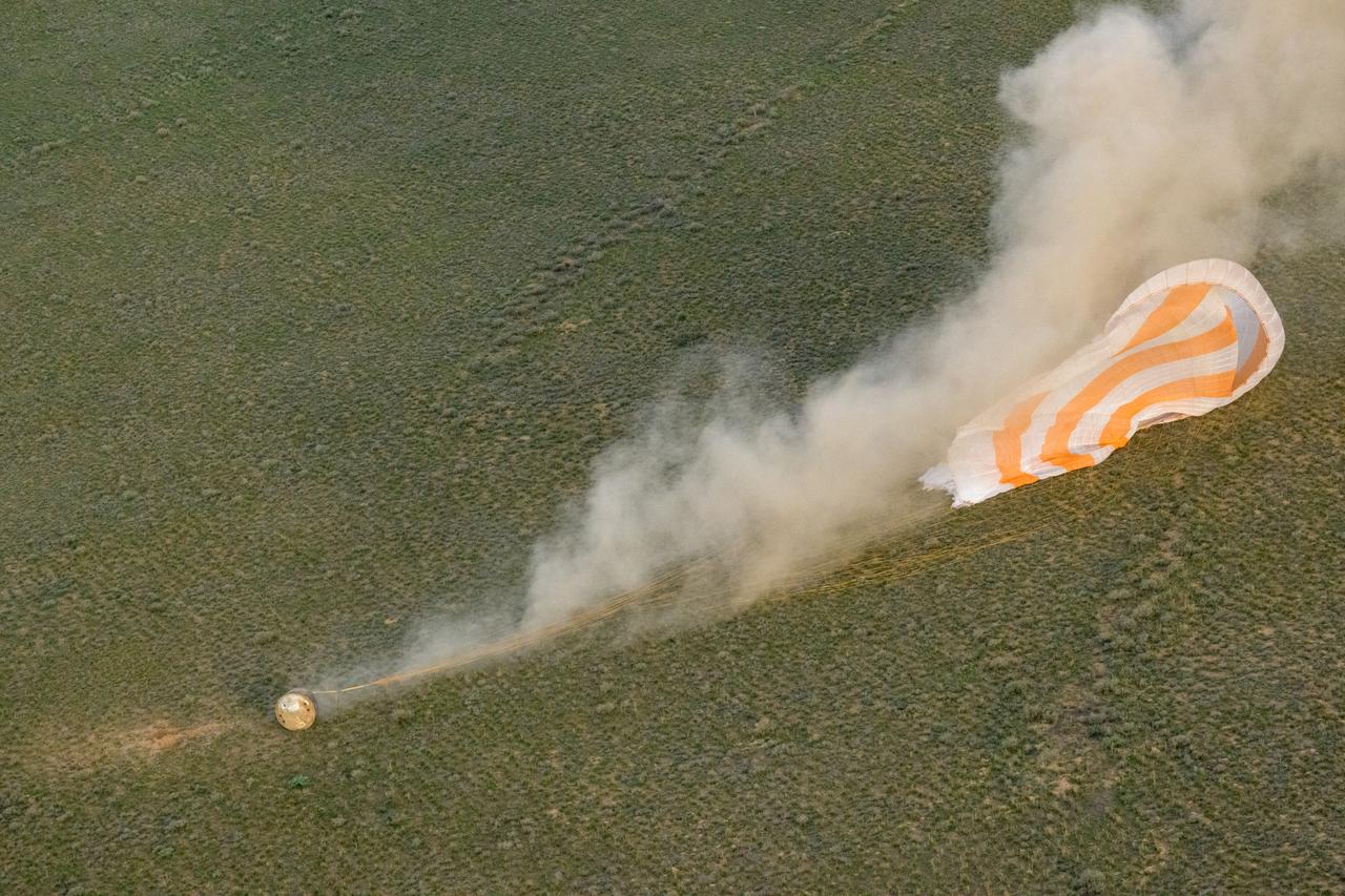 The Soyuz MS-26 spacecraft is seen as it lands in a remote area near the town of Zhezkazgan, Kazakhstan with Expedition 72 NASA astronaut Don Pettit, and Roscosmos cosmonauts Alexey Ovchinin and Ivan Vagner aboard, Sunday, April 20, 2025, (April 19 Eastern). The trio are returning to Earth after logging 220 days in space as a members of Expeditions 71 and 72 aboard the International Space Station. Photo Credit: (NASA/Bill Ingalls)