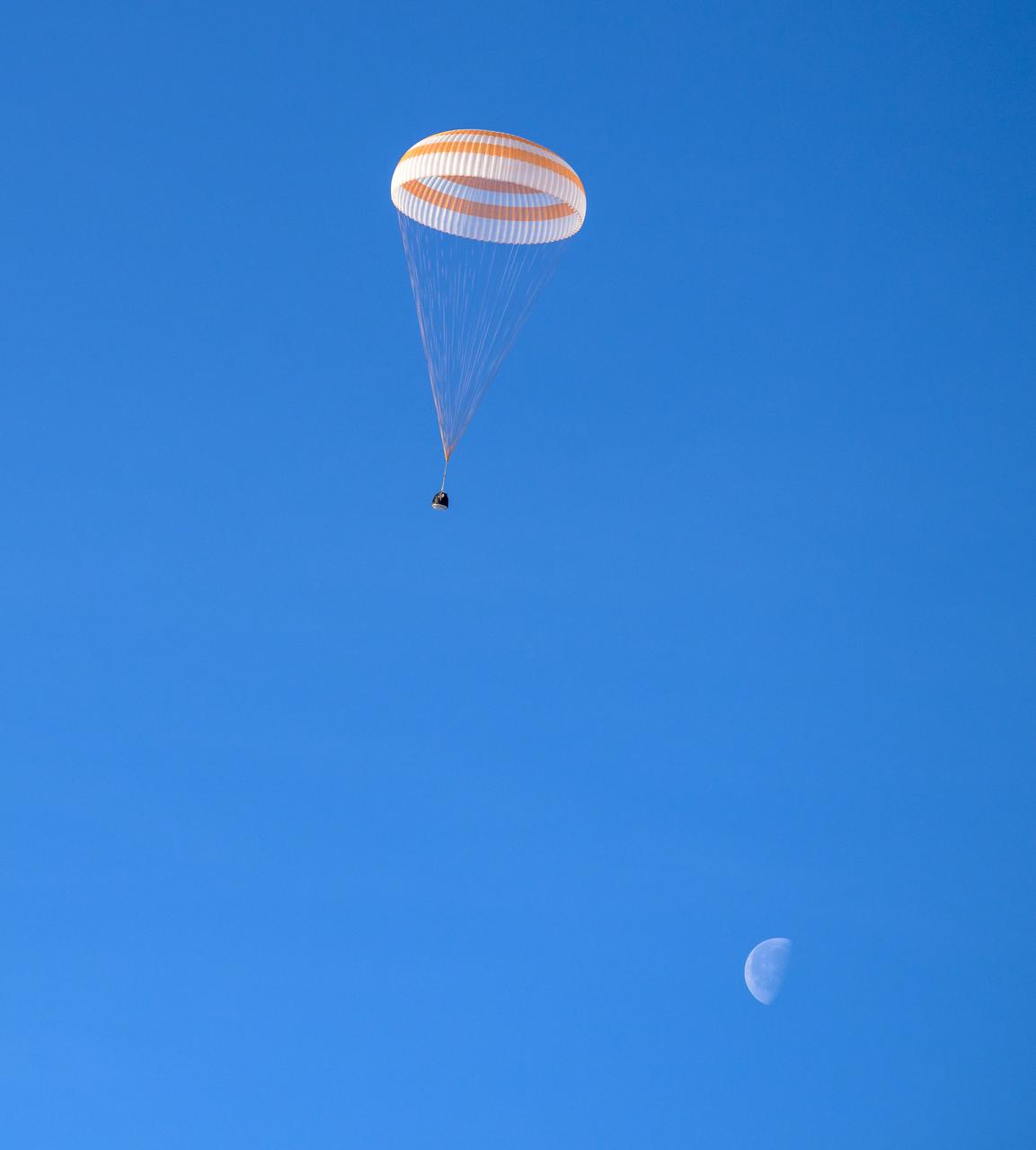 The Soyuz MS-26 spacecraft is seen as it lands in a remote area near the town of Zhezkazgan, Kazakhstan with Expedition 72 NASA astronaut Don Pettit, and Roscosmos cosmonauts Alexey Ovchinin and Ivan Vagner aboard, Sunday, April 20, 2025, (April 19 Eastern). The trio are returning to Earth after logging 220 days in space as members of Expeditions 71 and 72 aboard the International Space Station. Photo Credit: (NASA/Bill Ingalls)