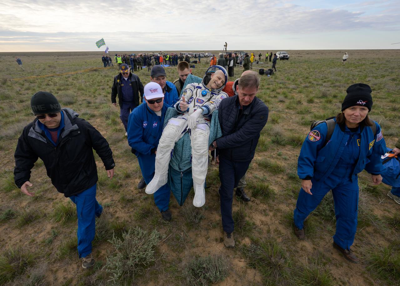 NASA astronaut Don Pettit is carried to a medical tent shortly after he, and Roscosmos cosmonauts Alexey Ovchinin and Ivan Vagner landed in their Soyuz MS-26 spacecraft near the town of Zhezkazgan, Kazakhstan on Sunday, April 20, 2025, (April 19 Eastern). The trio returned to Earth after logging 220 days in space as members of Expeditions 71 and 72 aboard the International Space Station. Photo Credit: (NASA/Bill Ingalls)