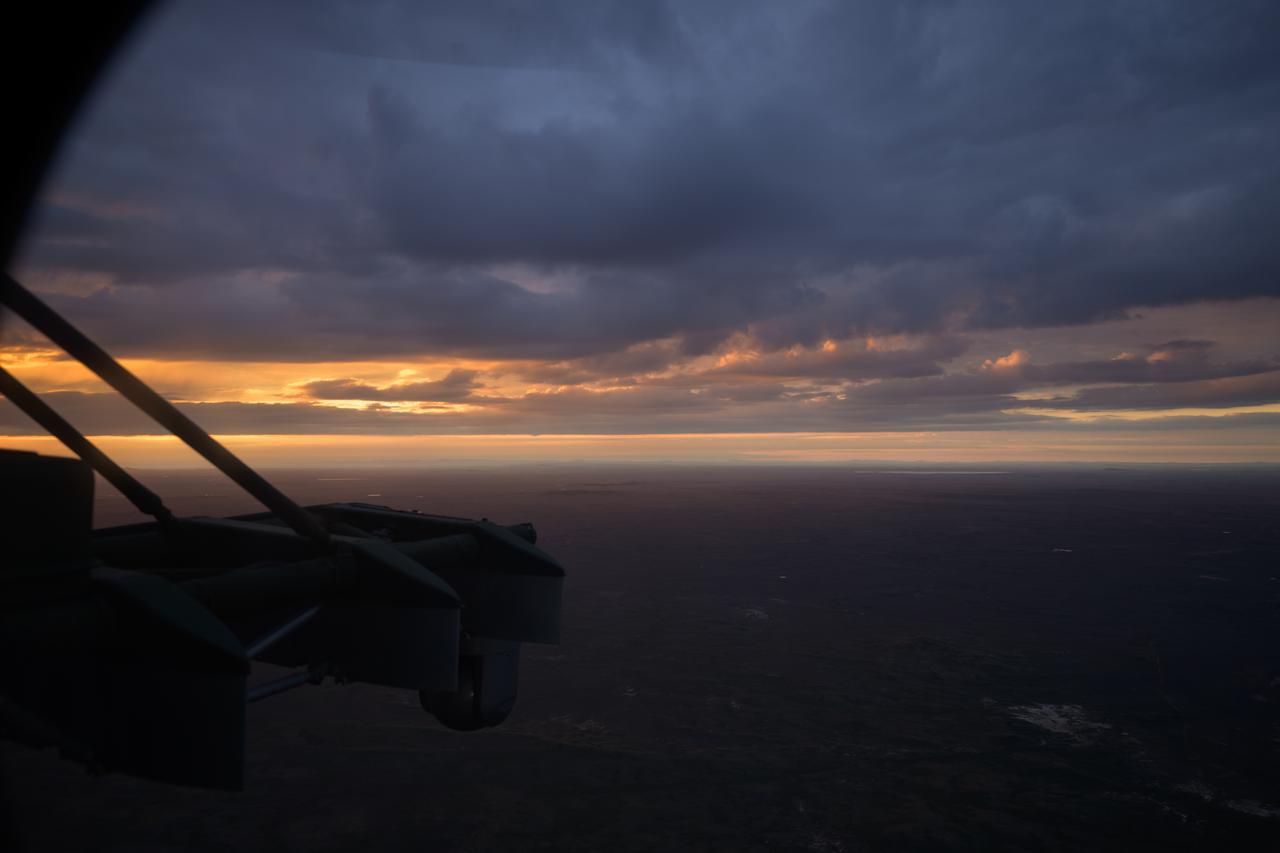 Sunrise is seen from a Russian MI-8 helicopter as teams support the landing of Expedition 72 NASA astronaut Don Pettit, and Roscosmos cosmonauts Alexey Ovchinin and Ivan Vagner, Sunday, April 20, 2025. The trio are returning to Earth after logging 220 days in space as members of Expeditions 71 and 72 aboard the International Space Station. Photo Credit: (NASA/Bill Ingalls)