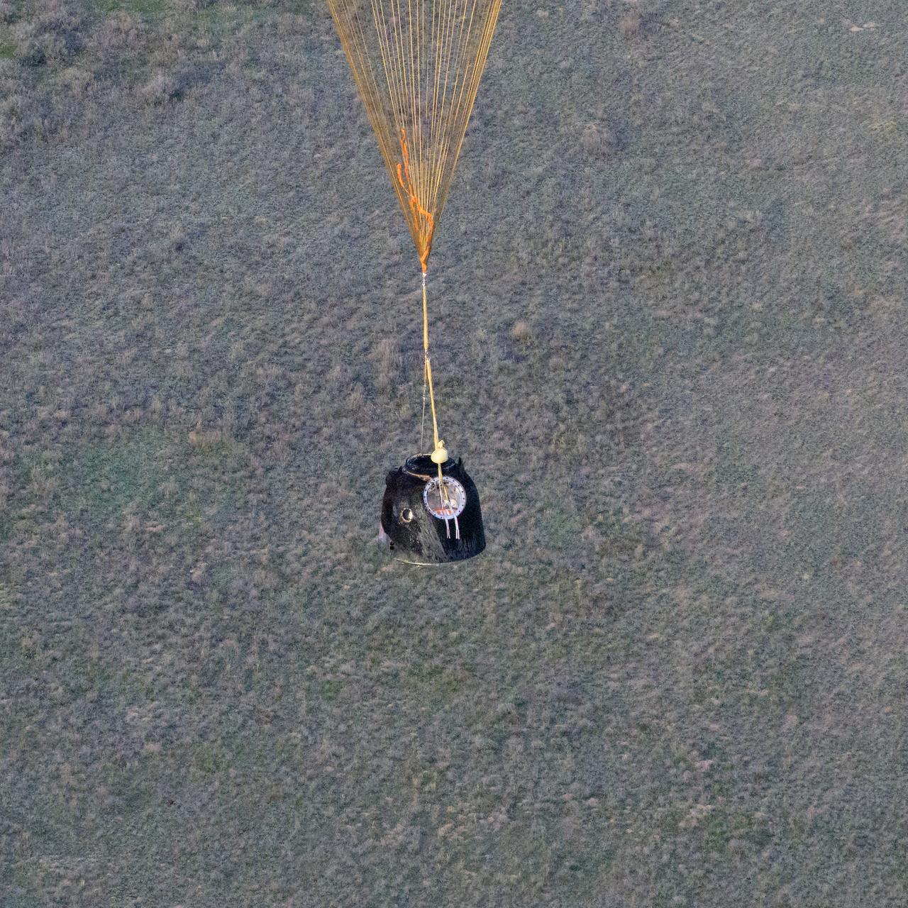The Soyuz MS-26 spacecraft is seen as it lands in a remote area near the town of Zhezkazgan, Kazakhstan with Expedition 72 NASA astronaut Don Pettit, and Roscosmos cosmonauts Alexey Ovchinin and Ivan Vagner aboard, Sunday, April 20, 2025, (April 19 Eastern). The trio are returning to Earth after logging 220 days in space as members of Expeditions 71 and 72 aboard the International Space Station. Photo Credit: (NASA/Bill Ingalls)