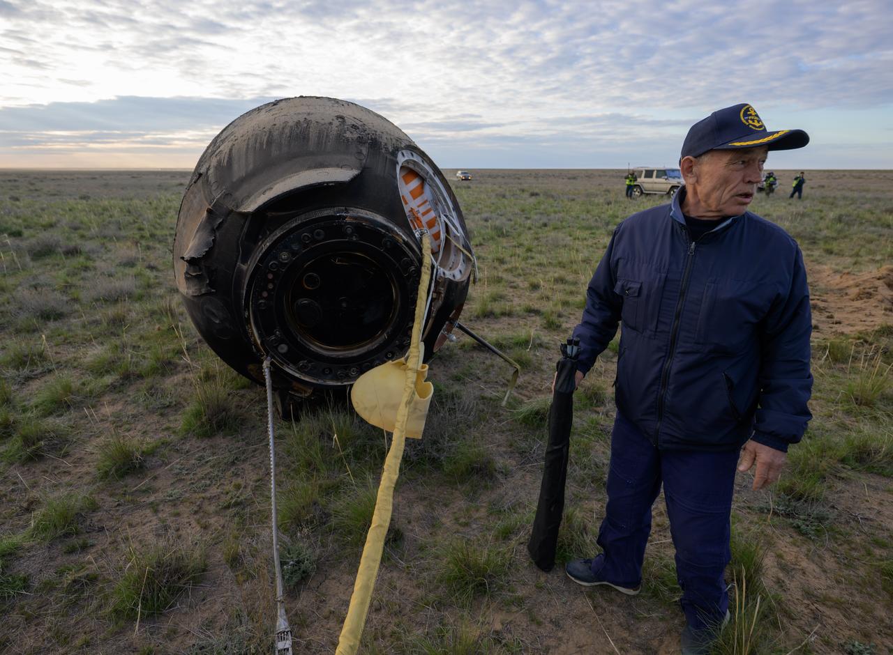 Russian Search and Rescue teams arrive at the Soyuz MS-26 spacecraft shortly after it landed in a remote area near the town of Zhezkazgan, Kazakhstan with Expedition 72 NASA astronaut Don Pettit, and Roscosmos cosmonauts Alexey Ovchinin and Ivan Vagner aboard, Sunday, April 20, 2025, (April 19 Eastern). The trio returned to Earth after logging 220 days in space as members of Expeditions 71 and 72 aboard the International Space Station. Photo Credit: (NASA/Bill Ingalls)