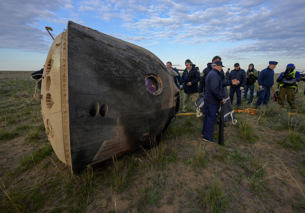 Russian Search and Rescue teams arrive at the Soyuz MS-26 spacecraft shortly after it landed in a remote area near the town of Zhezkazgan, Kazakhstan with Expedition 72 NASA astronaut Don Pettit, and Roscosmos cosmonauts Alexey Ovchinin and Ivan Vagner aboard, Sunday, April 20, 2025, (April 19 Eastern). The trio returned to Earth after logging 220 days in space as members of Expeditions 71 and 72 aboard the International Space Station. Photo Credit: (NASA/Bill Ingalls)