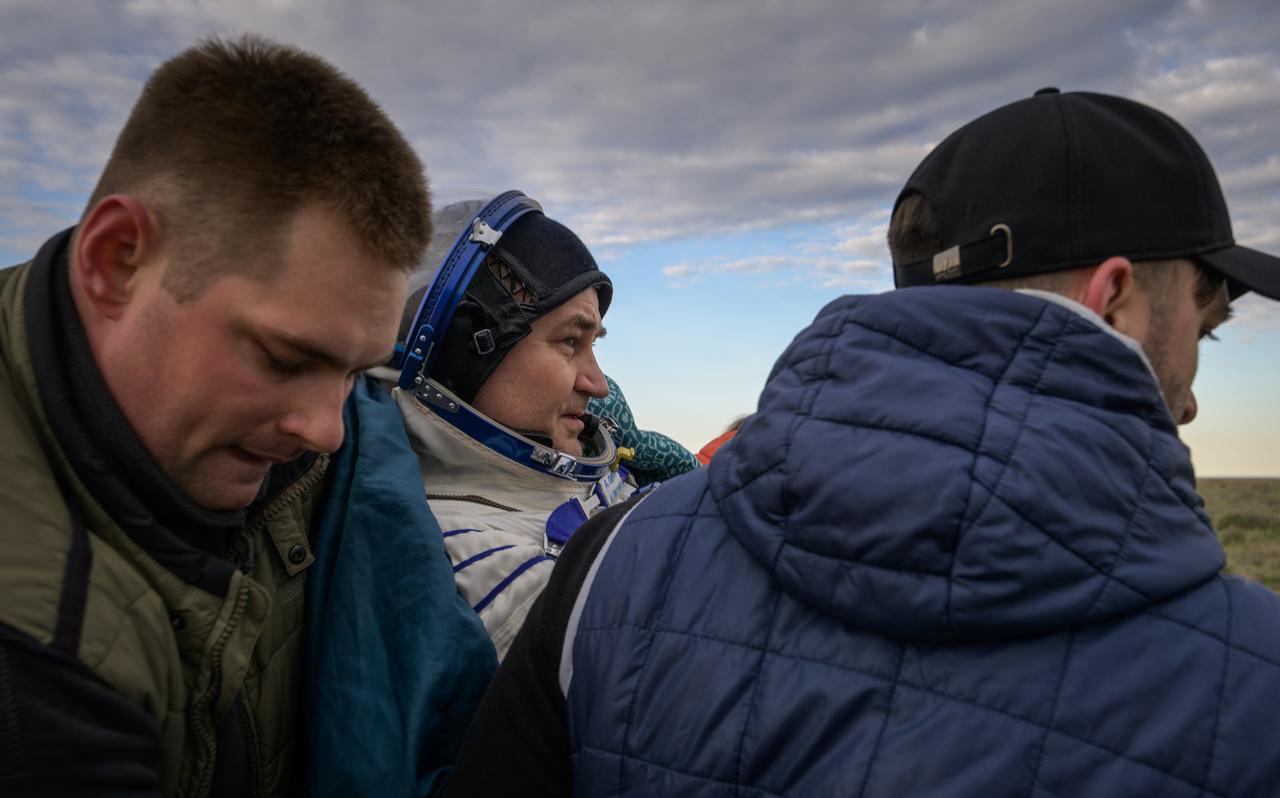 Roscosmos cosmonaut Alexey Ovchinin is seen outside the Soyuz MS-26 spacecraft after he landed with Roscosmos cosmonaut Ivan Vagner, and NASA astronaut Don Pettit in a remote area near the town of Zhezkazgan, Kazakhstan on Sunday, April 20, 2025, (April 19 Eastern). The trio returned to Earth after logging 220 days in space as members of Expeditions 71 and 72 aboard the International Space Station. Photo Credit: (NASA/Bill Ingalls)