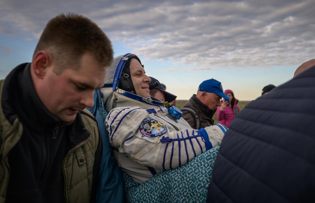 Roscosmos cosmonaut Ivan Vagner is carried to a medical tent shortly after he, Roscosmos cosmonaut Alexey Ovchinin, and NASA astronaut Don Pettit landed in their Soyuz MS-26 spacecraft near the town of Zhezkazgan, Kazakhstan on Sunday, April 20, 2025, (April 19 Eastern). The trio returned to Earth after logging 220 days in space as members of Expeditions 71 and 72 aboard the International Space Station. Photo Credit: (NASA/Bill Ingalls)