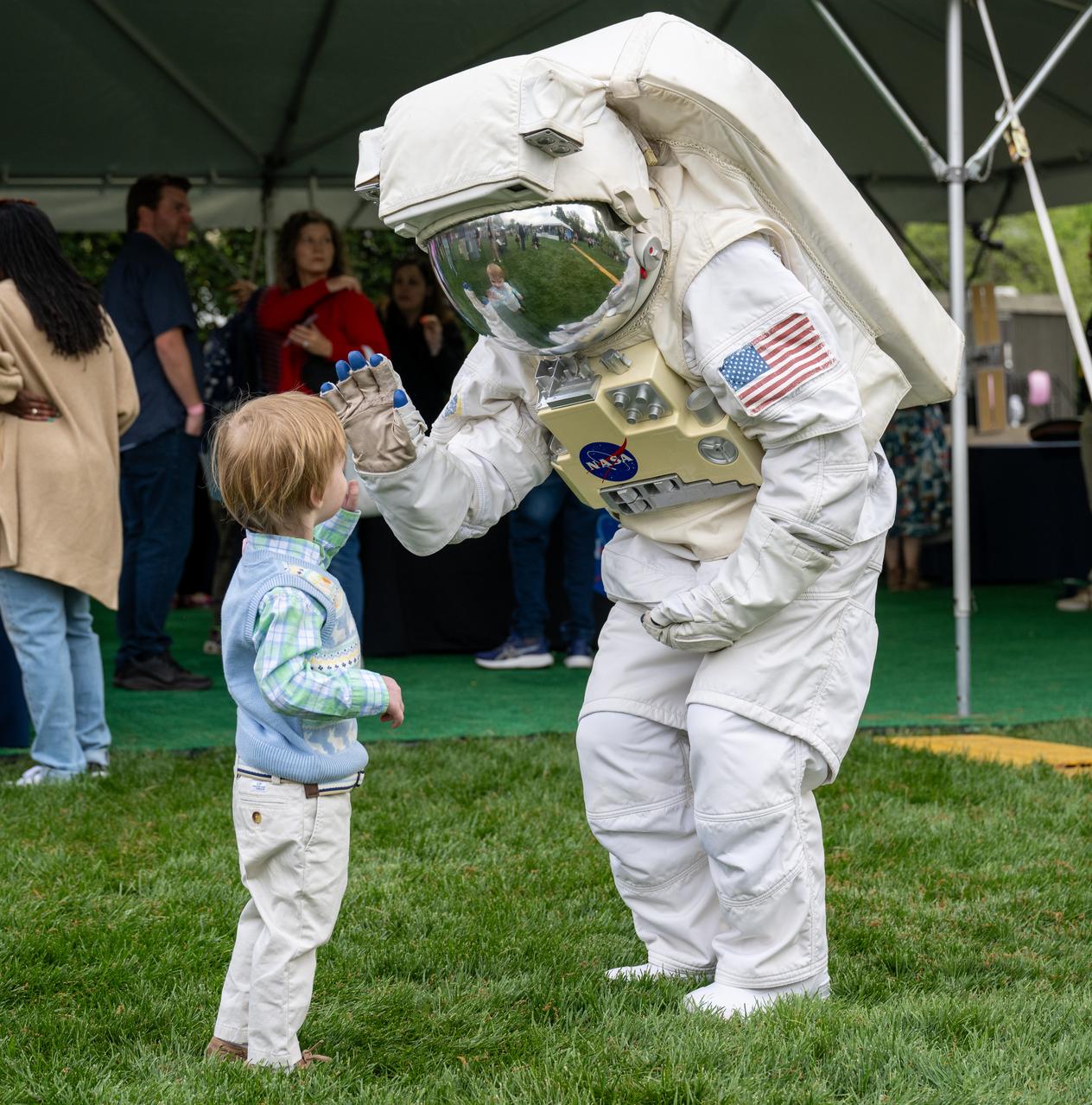 Spacey Casey poses for photos with guests during the White House Easter Egg Roll, Monday, April 21, 2025, on the South Lawn of the White House in Washington. Photo Credit: (NASA/Keegan Barber)
