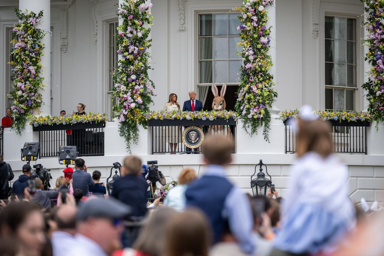 President Donald Trump, joined by First Lady Melania Trump, delivers remarks during the White House Easter Egg Roll, Monday, April 21, 2025, on the South Lawn of the White House in Washington. Photo Credit: (NASA/Keegan Barber)