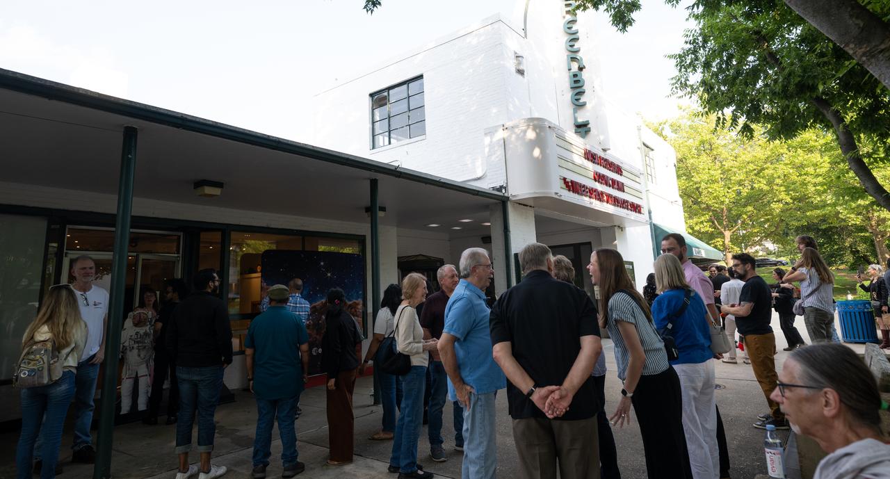 Attendees gather outside of the Greenbelt Cinema before a screening of the new NASA+ documentary “Cosmic Dawn: The Untold Story of the James Webb Space Telescope,” Wednesday, June 11, 2025, in Greenbelt, Maryland. Featuring never-before-seen footage, Cosmic Dawn offers an unprecedented glimpse into the assembly, testing, and launch of NASA’s James Webb Space Telescope.   Photo Credit: (NASA/Joel Kowsky)