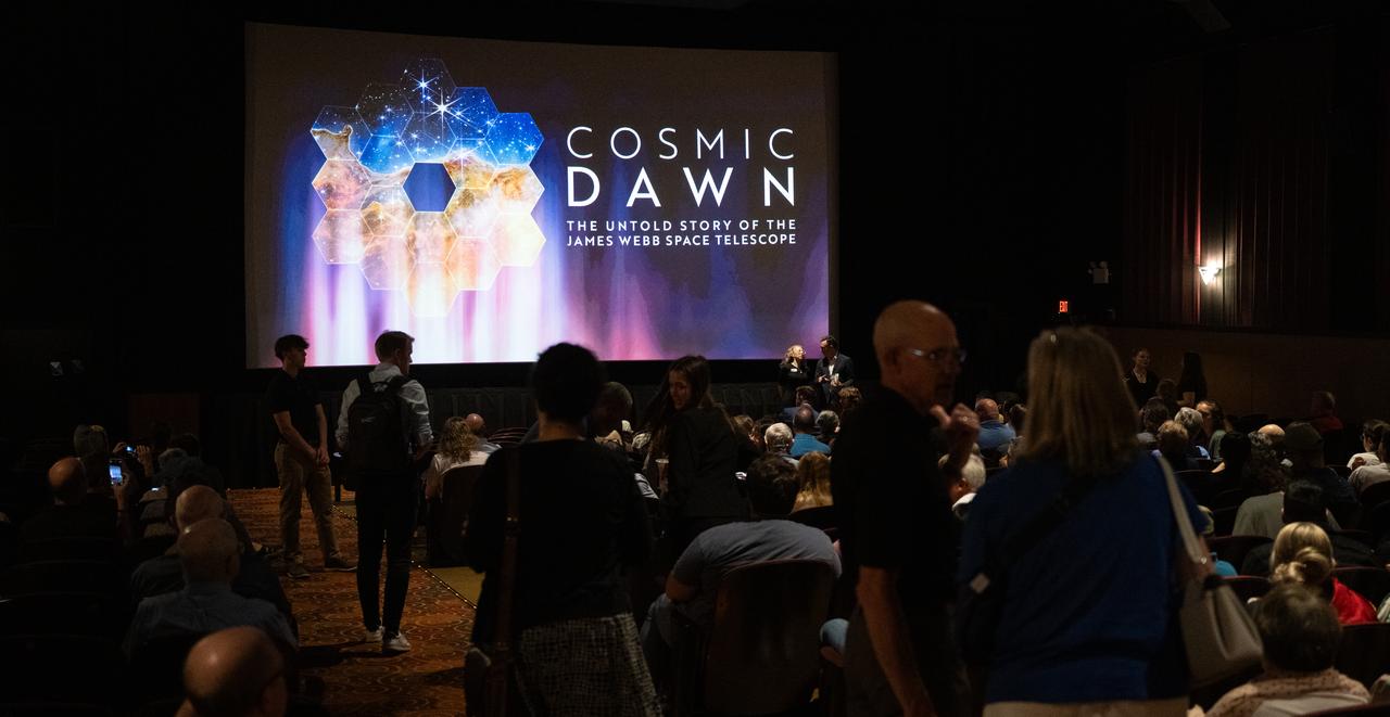 Attendees take their seats before a screening of the new NASA+ documentary “Cosmic Dawn: The Untold Story of the James Webb Space Telescope,” Wednesday, June 11, 2025, at the Greenbelt Cinema in Greenbelt, Maryland. Featuring never-before-seen footage, Cosmic Dawn offers an unprecedented glimpse into the assembly, testing, and launch of NASA’s James Webb Space Telescope.   Photo Credit: (NASA/Joel Kowsky)