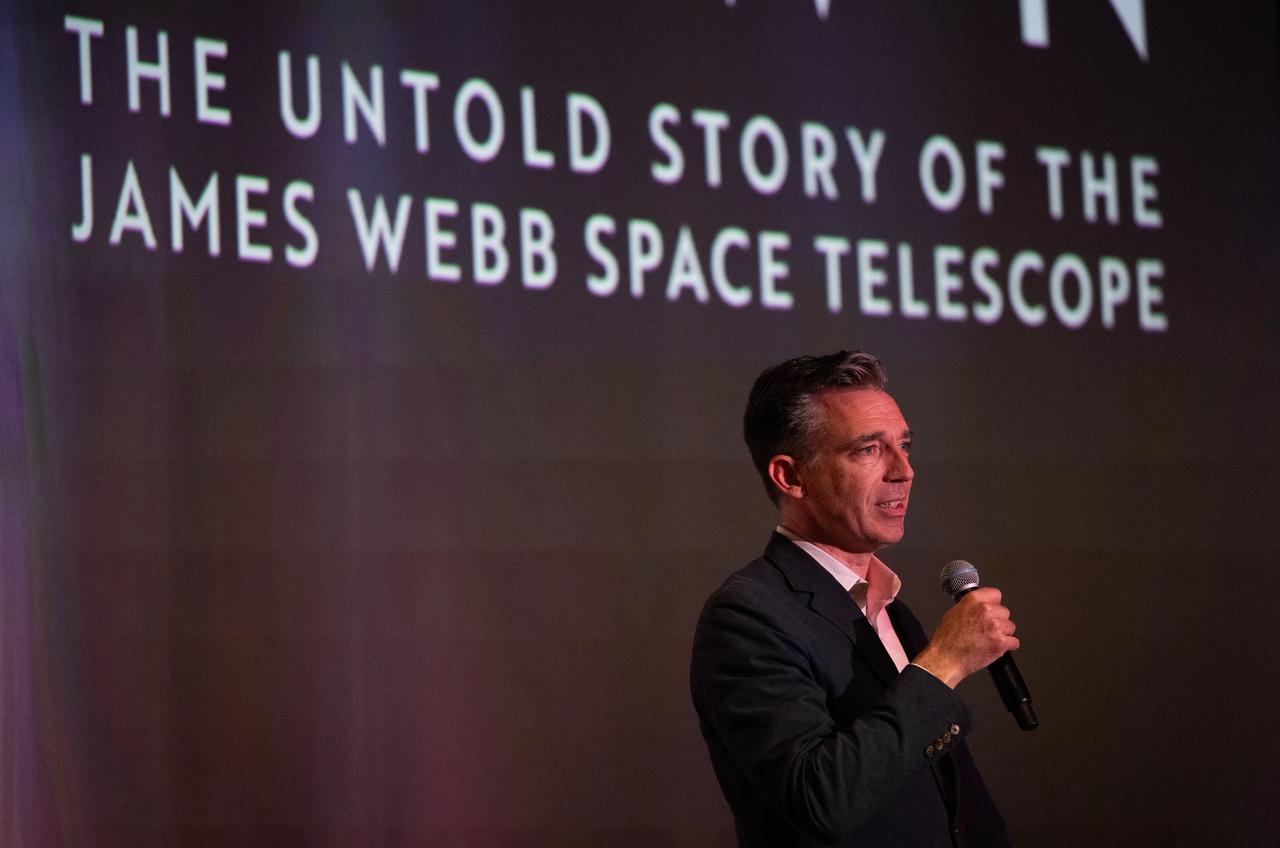 Patrick Lynch, director of the Office of Communications at NASA’s Goddard Space Flight Center, speaks before a screening of the new NASA+ documentary “Cosmic Dawn: The Untold Story of the James Webb Space Telescope,” Wednesday, June 11, 2025, at the Greenbelt Cinema in Greenbelt, Maryland. Featuring never-before-seen footage, Cosmic Dawn offers an unprecedented glimpse into the assembly, testing, and launch of NASA’s James Webb Space Telescope.   Photo Credit: (NASA/Joel Kowsky)