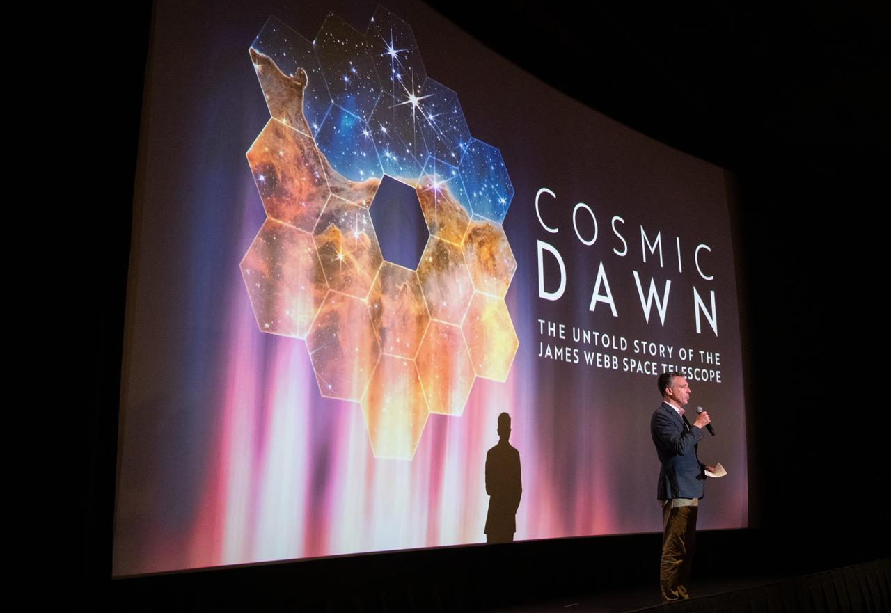 Patrick Lynch, director of the Office of Communications at NASA’s Goddard Space Flight Center, speaks before a screening of the new NASA+ documentary “Cosmic Dawn: The Untold Story of the James Webb Space Telescope,” Wednesday, June 11, 2025, at the Greenbelt Cinema in Greenbelt, Maryland. Featuring never-before-seen footage, Cosmic Dawn offers an unprecedented glimpse into the assembly, testing, and launch of NASA’s James Webb Space Telescope.   Photo Credit: (NASA/Joel Kowsky)