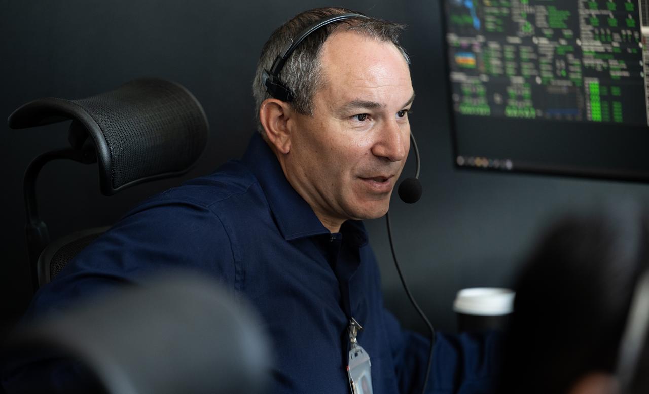 Kevin Vega, Commercial Crew Program Chief Engineer, monitors the countdown during a dress rehearsal in preparation for the launch of a SpaceX Falcon 9 rocket carrying the company's Dragon spacecraft on NASA’s SpaceX Crew-11 mission with NASA astronauts Zena Cardman, Mike Fincke, JAXA (Japan Aerospace Exploration Agency) astronaut Kimiya Yui, and Roscosmos cosmonaut Oleg Platonov onboard, Monday, July 28, 2025, in the control room of SpaceX’s HangerX at NASA’s Kennedy Space Center in Florida. NASA’s SpaceX Crew-11 mission is the eleventh crew rotation mission of the SpaceX Dragon spacecraft and Falcon 9 rocket to the International Space Station as part of the agency’s Commercial Crew Program. Cardman, Fincke, Yui, Platonov are scheduled to launch on 12:09 p.m. EDT on Thursday, July 31, from Launch Complex 39A at the NASA's Kennedy Space Center. Photo Credit: (NASA/Joel Kowsky)