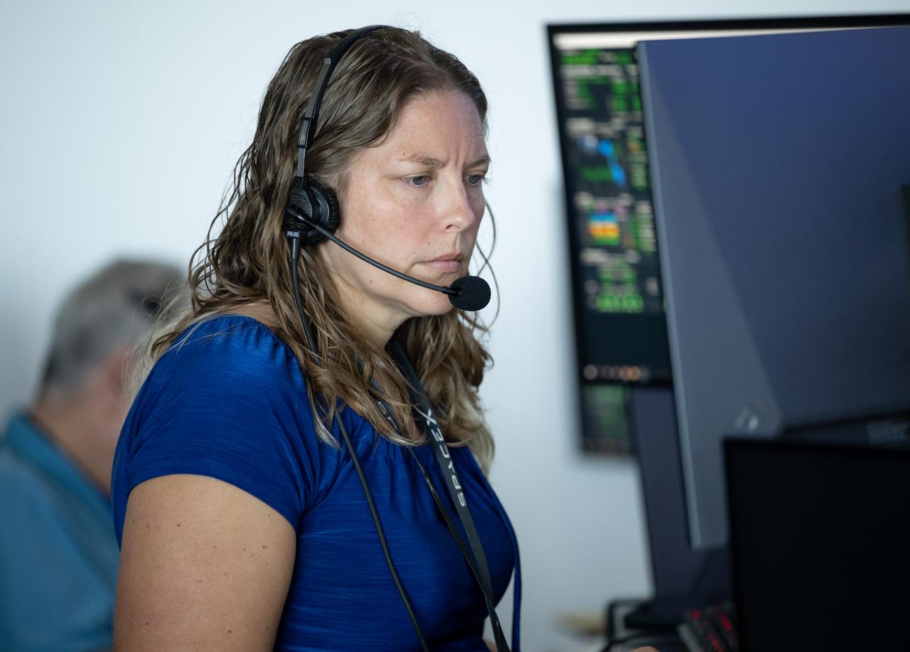 Melissa Mierzwa, a propulsions system engineer at NASA, monitors the countdown during a dress rehearsal in preparation for the launch of a SpaceX Falcon 9 rocket carrying the company's Dragon spacecraft on NASA’s SpaceX Crew-11 mission with NASA astronauts Zena Cardman, Mike Fincke, JAXA (Japan Aerospace Exploration Agency) astronaut Kimiya Yui, and Roscosmos cosmonaut Oleg Platonov onboard, Monday, July 28, 2025, in the control room of SpaceX’s HangerX at NASA’s Kennedy Space Center in Florida. NASA’s SpaceX Crew-11 mission is the eleventh crew rotation mission of the SpaceX Dragon spacecraft and Falcon 9 rocket to the International Space Station as part of the agency’s Commercial Crew Program. Cardman, Fincke, Yui, Platonov are scheduled to launch on 12:09 p.m. EDT on Thursday, July 31, from Launch Complex 39A at the NASA's Kennedy Space Center. Photo Credit: (NASA/Joel Kowsky)