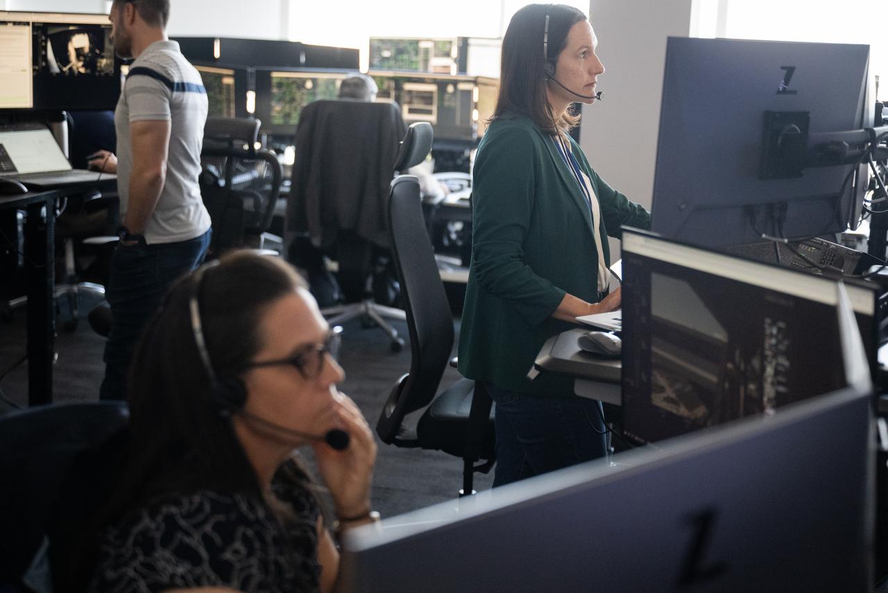 Nicole Jordan, NASA operations manager for the Commercial Crew Program, right, monitors the countdown during a dress rehearsal in preparation for the launch of a SpaceX Falcon 9 rocket carrying the company's Dragon spacecraft on NASA’s SpaceX Crew-11 mission with NASA astronauts Zena Cardman, Mike Fincke, JAXA (Japan Aerospace Exploration Agency) astronaut Kimiya Yui, and Roscosmos cosmonaut Oleg Platonov onboard, Monday, July 28, 2025, in the control room of SpaceX’s HangerX at NASA’s Kennedy Space Center in Florida. NASA’s SpaceX Crew-11 mission is the eleventh crew rotation mission of the SpaceX Dragon spacecraft and Falcon 9 rocket to the International Space Station as part of the agency’s Commercial Crew Program. Cardman, Fincke, Yui, Platonov are scheduled to launch on 12:09 p.m. EDT on Thursday, July 31, from Launch Complex 39A at the NASA's Kennedy Space Center. Photo Credit: (NASA/Joel Kowsky)