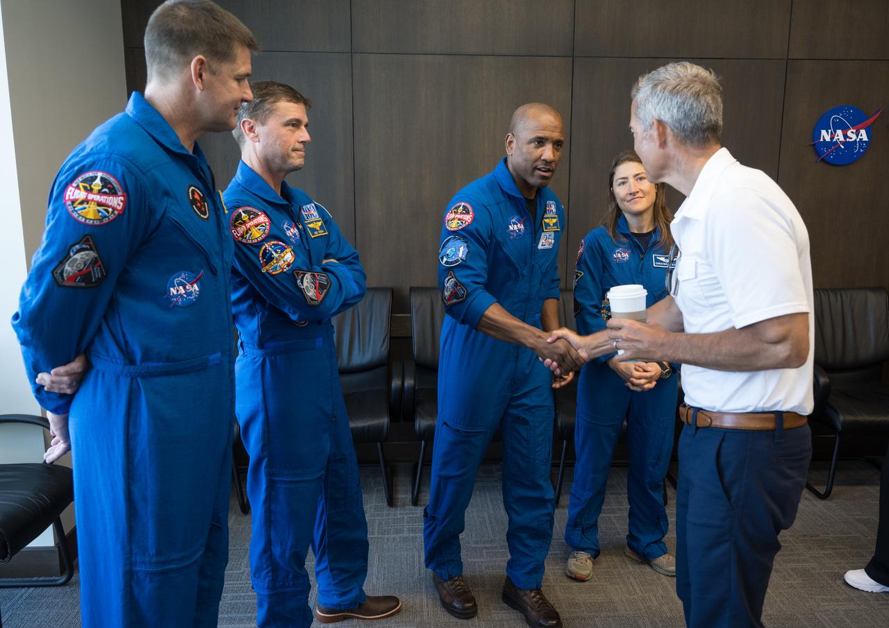 Acting NASA Administrator Sean Duffy, right, meets with Artemis II astronauts, from right to left, NASA astronauts Christina Koch, Victor Glover, Reid Wiseman, and Canadian Space Agency (CSA) astronaut Jeremy Hansen, Wednesday, July 30, 2025, at NASA’s Kennedy Space Center in Florida. Photo Credit: (NASA/Aubrey Gemignani)