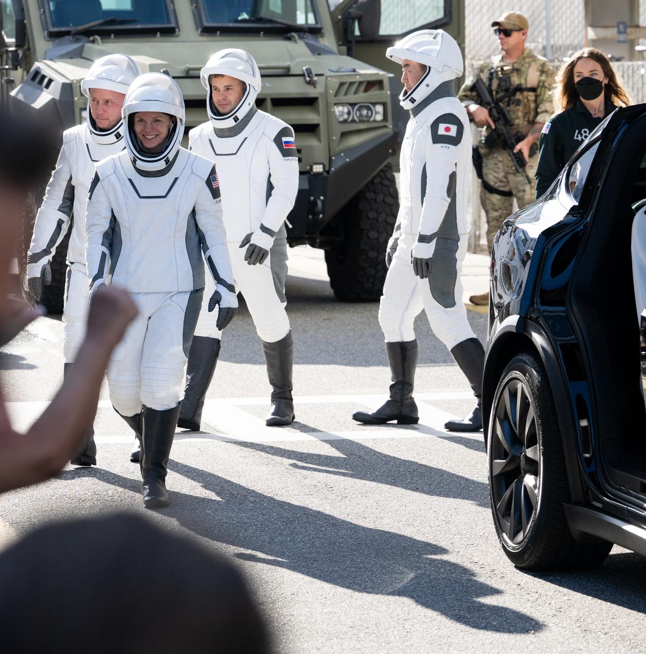 NASA astronauts Zena Cardman, Mike Fincke, Roscosmos cosmonaut Oleg Platonov, and JAXA (Japan Aerospace Exploration Agency) astronaut Kimiya Yui, wearing SpaceX spacesuits, are seen as they prepare to depart the Neil  A. Armstrong Operations and Checkout Building for Launch Complex 39A on NASA's Kennedy Space Center to board the SpaceX Dragon spacecraft for the Crew-11 mission launch, Thursday, July 31, 2025, at NASA’s Kennedy Space Center in Florida. NASA’s SpaceX Crew-11 mission is the eleventh crew rotation mission of the SpaceX Crew Dragon spacecraft and Falcon 9 rocket to the International Space Station as part of the agency’s Commercial Crew Program. Cardman, Fincke, Yui, Platonov are scheduled to launch at 12:09 p.m. EDT, from Launch Complex 39A at the NASA's Kennedy Space Center.  Photo Credit: (NASA/Joel Kowsky)