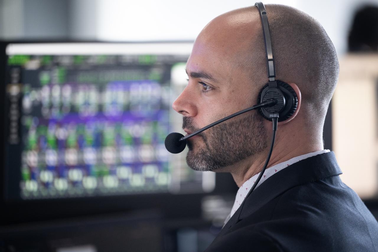 Max Schneiderman, an aerospace flight systems engineer at NASA, monitors the countdown of a launch attempt of a SpaceX Falcon 9 rocket carrying the company's Dragon spacecraft on NASA’s SpaceX Crew-11 mission with NASA astronauts Zena Cardman, Mike Fincke, JAXA (Japan Aerospace Exploration Agency) astronaut Kimiya Yui, and Roscosmos cosmonaut Oleg Platonov onboard, Thursday, July 31, 2025, in the control center of SpaceX’s HangarX at NASA’s Kennedy Space Center in Florida. NASA’s SpaceX Crew-11 mission is the eleventh crew rotation mission of the SpaceX Dragon spacecraft and Falcon 9 rocket to the International Space Station as part of the agency’s Commercial Crew Program. Today’s launch of Cardman, Fincke, Yui, Platonov was scrubbed due to weather and is now scheduled for 11:43 a.m. EDT on Friday, August 1, from Launch Complex 39A at the NASA's Kennedy Space Center. Photo Credit: (NASA/Joel Kowsky)
