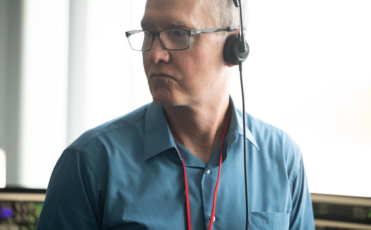 W. Russ DeLoach, NASA's Chief of Safety and Mission Assurance, monitors the countdown of a launch attempt of a SpaceX Falcon 9 rocket carrying the company's Dragon spacecraft on NASA’s SpaceX Crew-11 mission with NASA astronauts Zena Cardman, Mike Fincke, JAXA (Japan Aerospace Exploration Agency) astronaut Kimiya Yui, and Roscosmos cosmonaut Oleg Platonov onboard, Thursday, July 31, 2025, in the control center of SpaceX’s HangarX at NASA’s Kennedy Space Center in Florida. NASA’s SpaceX Crew-11 mission is the eleventh crew rotation mission of the SpaceX Dragon spacecraft and Falcon 9 rocket to the International Space Station as part of the agency’s Commercial Crew Program. Today’s launch of Cardman, Fincke, Yui, Platonov was scrubbed due to weather and is now scheduled for 11:43 a.m. EDT on Friday, August 1, from Launch Complex 39A at the NASA's Kennedy Space Center. Photo Credit: (NASA/Joel Kowsky)