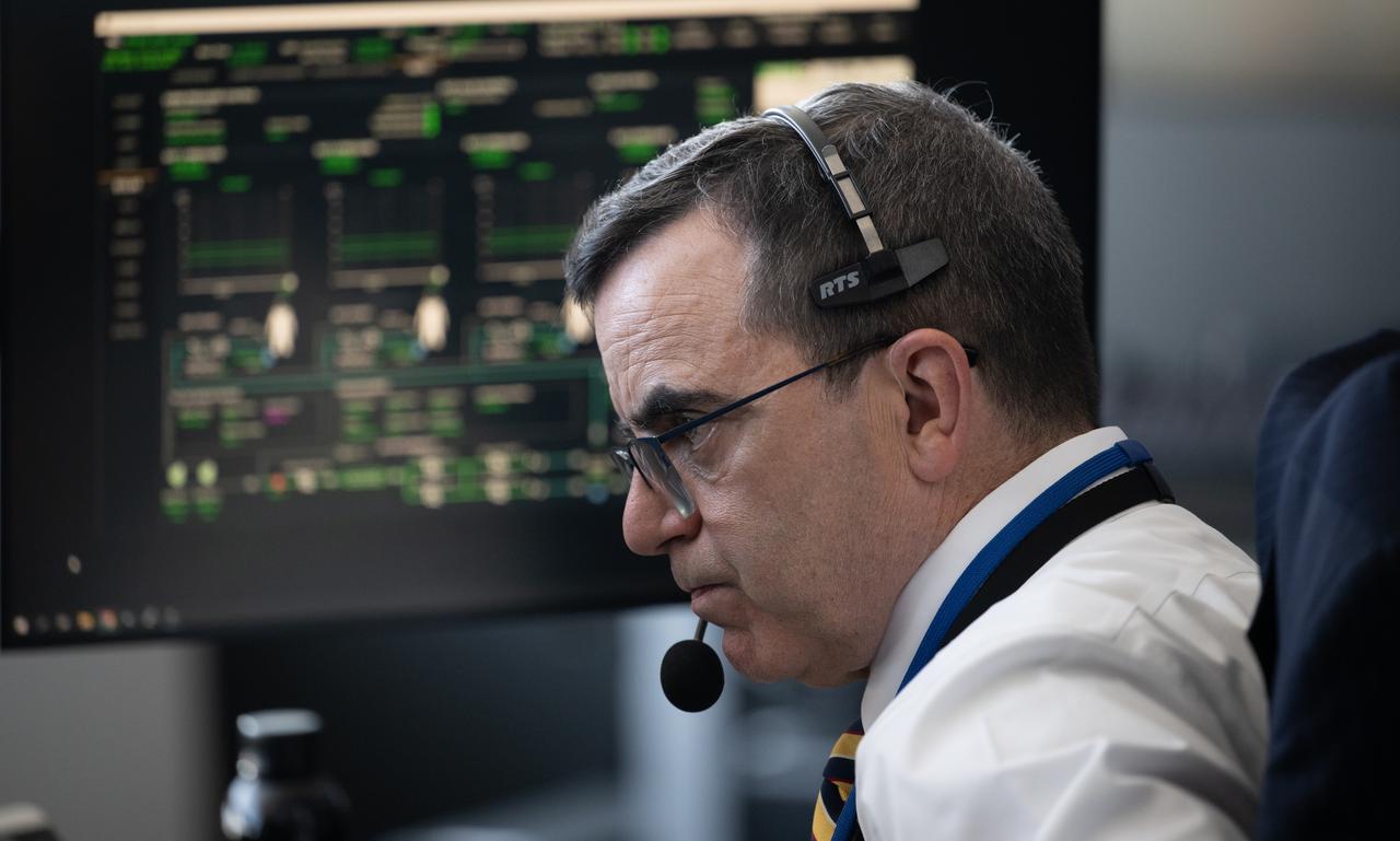 Dr. J.D. Polk, NASA's Chief Health and Medical Officer, monitors the countdown of a launch attempt of a SpaceX Falcon 9 rocket carrying the company's Dragon spacecraft on NASA’s SpaceX Crew-11 mission with NASA astronauts Zena Cardman, Mike Fincke, JAXA (Japan Aerospace Exploration Agency) astronaut Kimiya Yui, and Roscosmos cosmonaut Oleg Platonov onboard, Thursday, July 31, 2025, in the control center of SpaceX’s HangarX at NASA’s Kennedy Space Center in Florida. NASA’s SpaceX Crew-11 mission is the eleventh crew rotation mission of the SpaceX Dragon spacecraft and Falcon 9 rocket to the International Space Station as part of the agency’s Commercial Crew Program. Today’s launch of Cardman, Fincke, Yui, Platonov was scrubbed due to weather and is now scheduled for 11:43 a.m. EDT on Friday, August 1, from Launch Complex 39A at the NASA's Kennedy Space Center. Photo Credit: (NASA/Joel Kowsky)