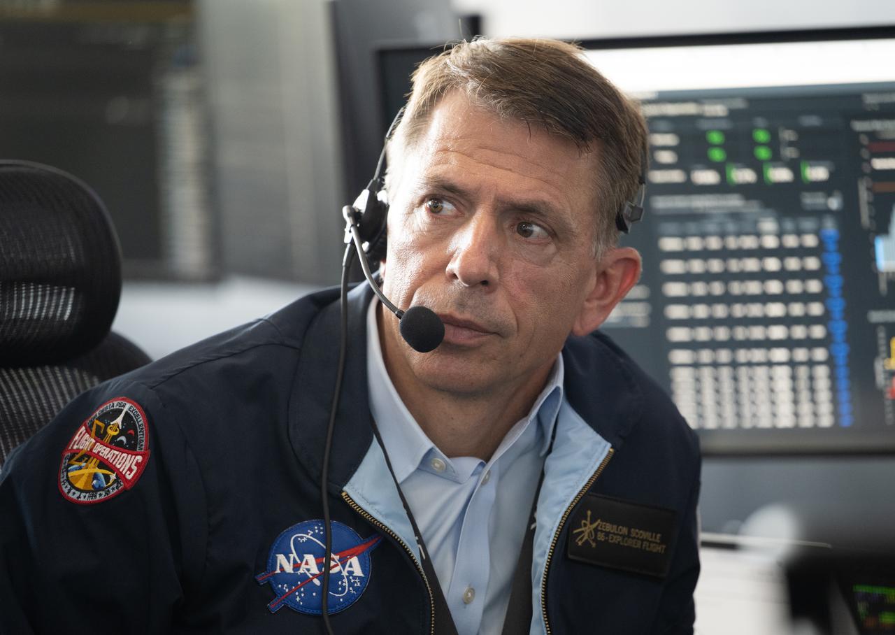 Zeb Scoville, NASA's deputy chief flight director, monitors the countdown of a launch attempt of a SpaceX Falcon 9 rocket carrying the company's Dragon spacecraft on NASA’s SpaceX Crew-11 mission with NASA astronauts Zena Cardman, Mike Fincke, JAXA (Japan Aerospace Exploration Agency) astronaut Kimiya Yui, and Roscosmos cosmonaut Oleg Platonov onboard, Thursday, July 31, 2025, in the control center of SpaceX’s HangarX at NASA’s Kennedy Space Center in Florida. NASA’s SpaceX Crew-11 mission is the eleventh crew rotation mission of the SpaceX Dragon spacecraft and Falcon 9 rocket to the International Space Station as part of the agency’s Commercial Crew Program. Today’s launch of Cardman, Fincke, Yui, Platonov was scrubbed due to weather and is now scheduled for 11:43 a.m. EDT on Friday, August 1, from Launch Complex 39A at the NASA's Kennedy Space Center. Photo Credit: (NASA/Joel Kowsky)