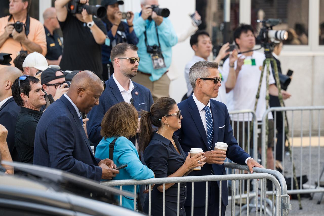 From right to left, Acting NASA Administrator Sean Duffy, his wife Rachel Campos-Duffy, acting NASA Associate Administrator Vanessa Wyche, and Deputy Director of NASA’s Kennedy Space Center, Kelvin Manning, watch as NASA astronauts Zena Cardman, Mike Fincke, JAXA (Japan Aerospace Exploration Agency) astronaut Kimiya Yui, and Roscosmos cosmonaut Oleg Platonov, depart the Neil  A. Armstrong Operations and Checkout Building for Launch Complex 39A on NASA's Kennedy Space Center to board the SpaceX Dragon spacecraft for the Crew-11 mission launch, before it was scrubbed due to weather concerns, Thursday, July 31, 2025, at NASA’s Kennedy Space Center in Florida. NASA’s SpaceX Crew-11 mission is the eleventh crew rotation mission of the SpaceX Crew Dragon spacecraft and Falcon 9 rocket to the International Space Station as part of the agency’s Commercial Crew Program. Cardman, Fincke, Yui, and Platonov launched at 11:43 a.m. EDT, Friday, August 1, from Launch Complex 39A at the NASA's Kennedy Space Center.  Photo Credit: (NASA/Aubrey Gemignani)