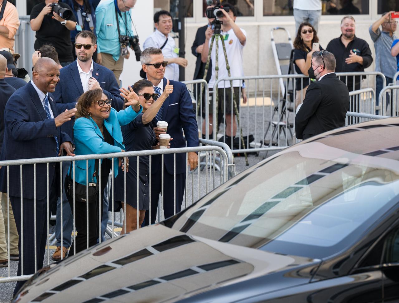 From right to left, Acting NASA Administrator Sean Duffy, his wife Rachel Campos-Duffy, acting NASA Associate Administrator Vanessa Wyche, and Deputy Director of NASA’s Kennedy Space Center, Kelvin Manning, wave as NASA astronauts Zena Cardman, Mike Fincke, JAXA (Japan Aerospace Exploration Agency) astronaut Kimiya Yui, and Roscosmos cosmonaut Oleg Platonov, depart the Neil  A. Armstrong Operations and Checkout Building for Launch Complex 39A on NASA's Kennedy Space Center to board the SpaceX Dragon spacecraft for the Crew-11 mission launch, before it was scrubbed due to weather concerns, Thursday, July 31, 2025, at NASA’s Kennedy Space Center in Florida. NASA’s SpaceX Crew-11 mission is the eleventh crew rotation mission of the SpaceX Crew Dragon spacecraft and Falcon 9 rocket to the International Space Station as part of the agency’s Commercial Crew Program. Cardman, Fincke, Yui, and Platonov launched at 11:43 a.m. EDT, Friday, August 1, from Launch Complex 39A at the NASA's Kennedy Space Center.  Photo Credit: (NASA/Aubrey Gemignani)
