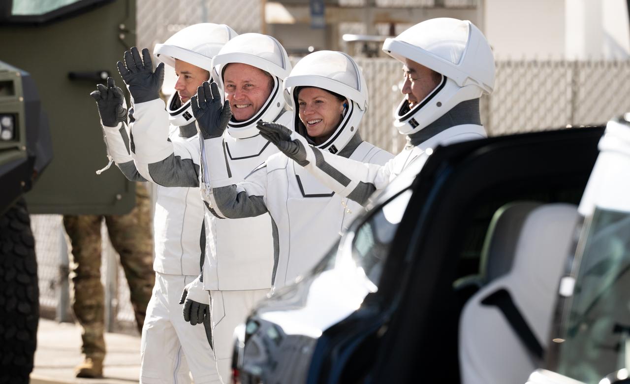 JAXA (Japan Aerospace Exploration Agency) astronaut Kimiya Yui, right, NASA astronauts Zena Cardman, Mike Fincke, and Roscosmos cosmonaut Oleg Platonov, wearing SpaceX spacesuits, are seen as they prepare to depart the Neil  A. Armstrong Operations and Checkout Building for Launch Complex 39A on NASA's Kennedy Space Center to board the SpaceX Dragon spacecraft for the Crew-11 mission launch, Friday, Aug. 1, 2025, at NASA’s Kennedy Space Center in Florida. NASA’s SpaceX Crew-11 mission is the eleventh crew rotation mission of the SpaceX Crew Dragon spacecraft and Falcon 9 rocket to the International Space Station as part of the agency’s Commercial Crew Program. Cardman, Fincke, Yui, Platonov are scheduled to launch at 11:43 a.m. EDT, from Launch Complex 39A at the NASA's Kennedy Space Center.  Photo Credit: (NASA/Joel Kowsky)