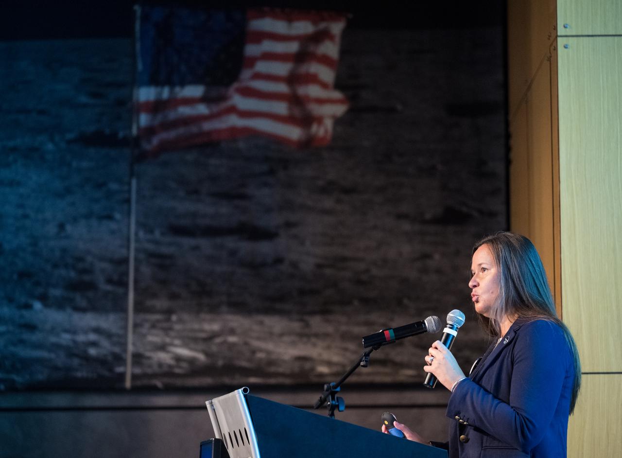 Amanda Cutright, acting associate director for Earth Action and Strategic Engagement for the Science Mission Directorate at NASA's Langley Research Center (LaRC), provides remarks before the presentation of DEVELOP Projects, Tuesday, August 5, 2025, at the Mary W. Jackson NASA Headquarters building in Washington. Every summer early career researchers from NASA’s DEVELOP National Program come to NASA Headquarters and present their research projects. DEVELOP is a training and development program where early career researchers work on Earth science projects, mentored by science advisors from NASA and partner agencies, and provide research results to local communities. Photo Credit: (NASA/Aubrey Gemignani)
