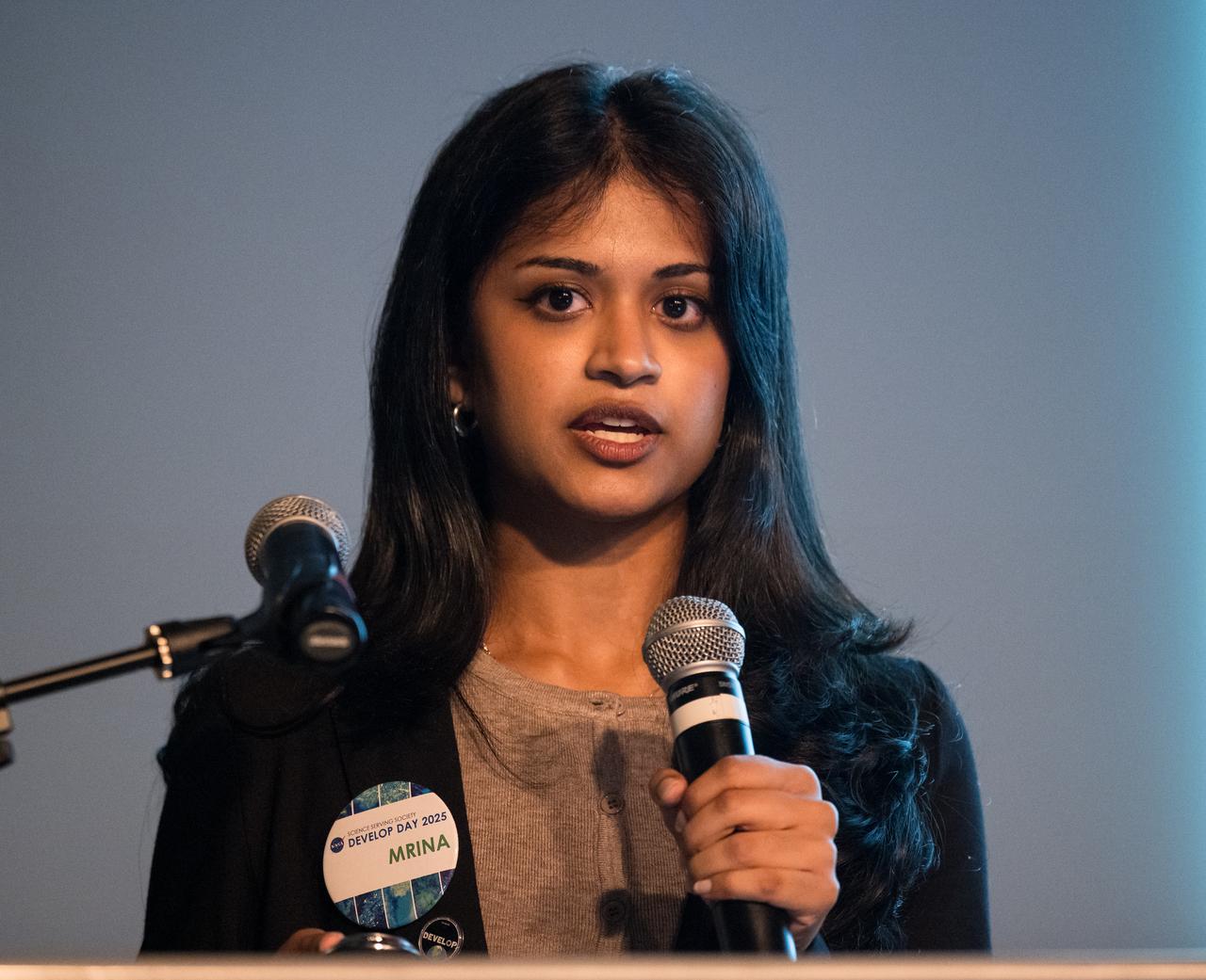 Mrinalee Reddy provides remarks about her DEVELOP Project, Tuesday, August 6, 2024, at the Mary W. Jackson NASA Headquarters building in Washington. Every summer early career researchers from NASA’s DEVELOP National Program come to NASA Headquarters and present their research projects. DEVELOP is a training and development program where early career researchers work on Earth science projects, mentored by science advisors from NASA and partner agencies, and provide research results to local communities. Photo Credit: (NASA/Aubrey Gemignani)