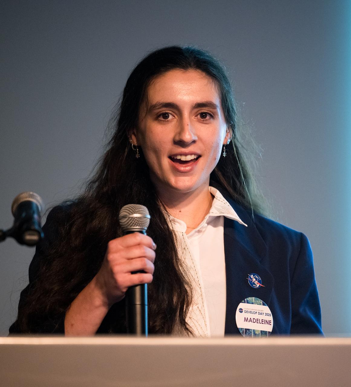 Madeleine Festin provides remarks about her DEVELOP Project, Tuesday, August 6, 2024, at the Mary W. Jackson NASA Headquarters building in Washington. Every summer early career researchers from NASA’s DEVELOP National Program come to NASA Headquarters and present their research projects. DEVELOP is a training and development program where early career researchers work on Earth science projects, mentored by science advisors from NASA and partner agencies, and provide research results to local communities. Photo Credit: (NASA/Aubrey Gemignani)
