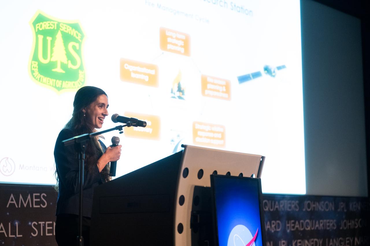 Madeleine Festin provides remarks about her DEVELOP Project, Tuesday, August 6, 2024, at the Mary W. Jackson NASA Headquarters building in Washington. Every summer early career researchers from NASA’s DEVELOP National Program come to NASA Headquarters and present their research projects. DEVELOP is a training and development program where early career researchers work on Earth science projects, mentored by science advisors from NASA and partner agencies, and provide research results to local communities. Photo Credit: (NASA/Aubrey Gemignani)