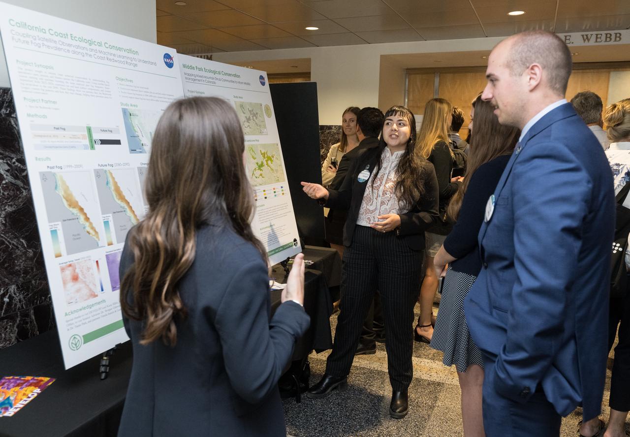 Students and young professionals share the results of their DEVELOP Project, Tuesday, August 5, 2025, at the Mary W. Jackson NASA Headquarters building in Washington. Every summer early career researchers from NASA’s DEVELOP National Program come to NASA Headquarters and present their research projects. DEVELOP is a training and development program where early career researchers work on Earth science projects, mentored by science advisors from NASA and partner agencies, and provide research results to local communities. Photo Credit: (NASA/Aubrey Gemignani)