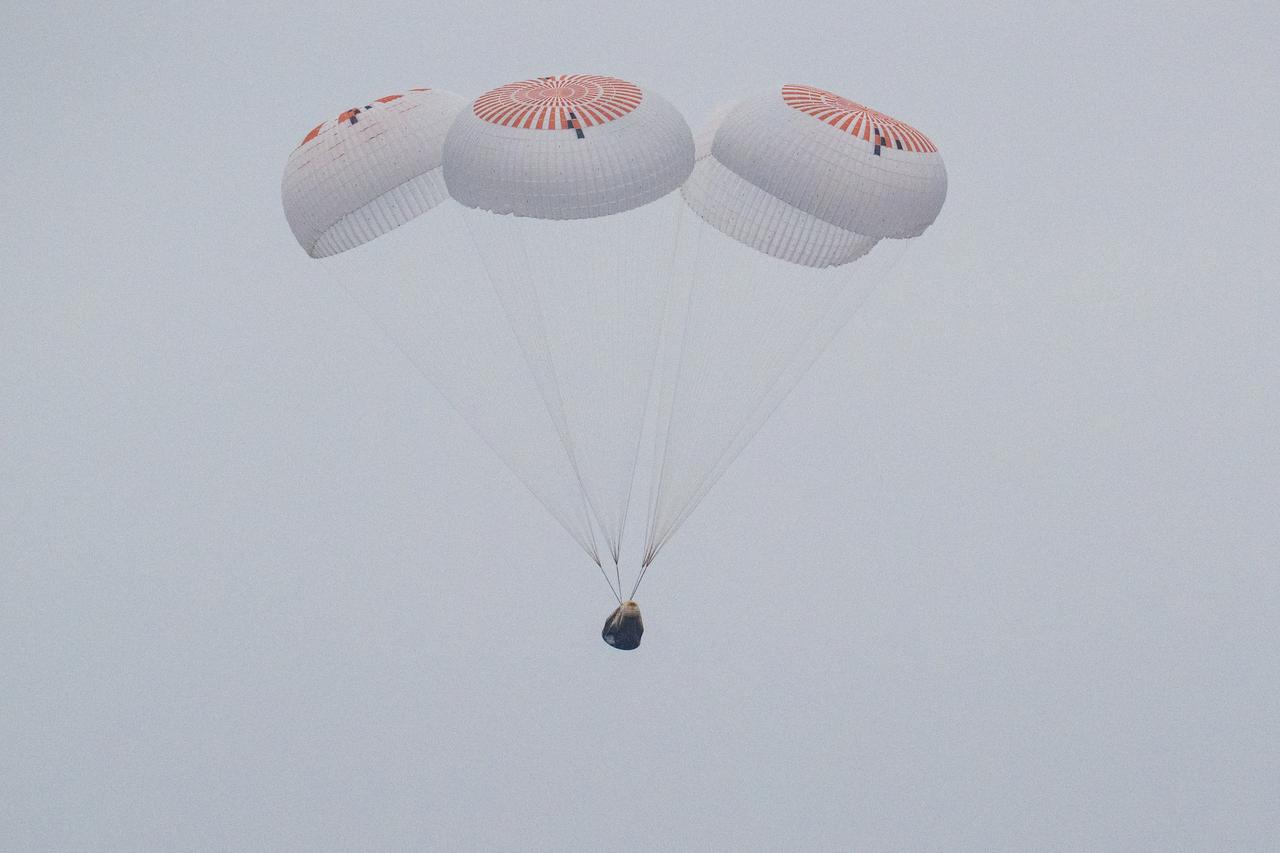 The SpaceX Crew Dragon Endurance spacecraft is seen as it lands with NASA astronauts Anne McClain and Nichole Ayers, JAXA (Japan Aerospace Exploration Agency) astronaut Takuya Onishi, and Roscosmos cosmonaut Kirill Peskov aboard in the Pacific Ocean off the coast of San Diego, Calif., Saturday, Aug. 9, 2025. McClain, Ayers, Onishi, and Peskov are returning after 147 days in space as part of Expedition 73 aboard the International Space Station. Photo Credit: (NASA/Keegan Barber)