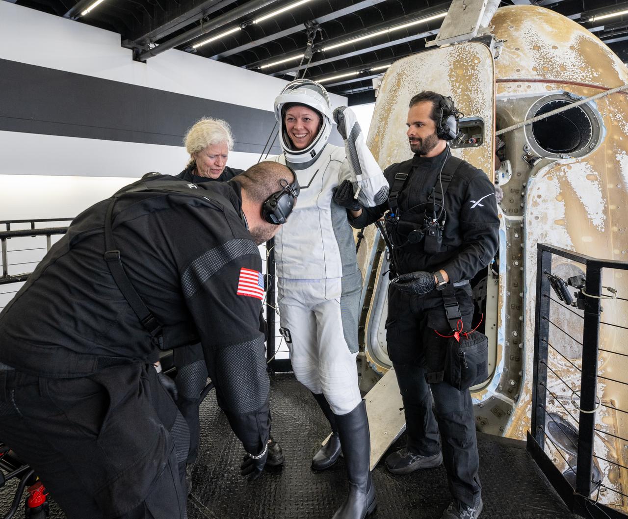 NASA astronaut Nichole Ayers helped out of the SpaceX Dragon Endurance spacecraft onboard the SpaceX recovery ship SHANNON after she, NASA astronaut Anne McClain, JAXA (Japan Aerospace Exploration Agency) astronaut Takuya Onishi, and Roscosmos cosmonaut Kirill Peskov landed in the Pacific Ocean off the coast of San Diego, Calif., Saturday, Aug. 9, 2025. McClain, Ayers, Onishi, and Peskov are returning after 147 days in space as part of Expedition 73 aboard the International Space Station. Photo Credit: (NASA/Keegan Barber)
