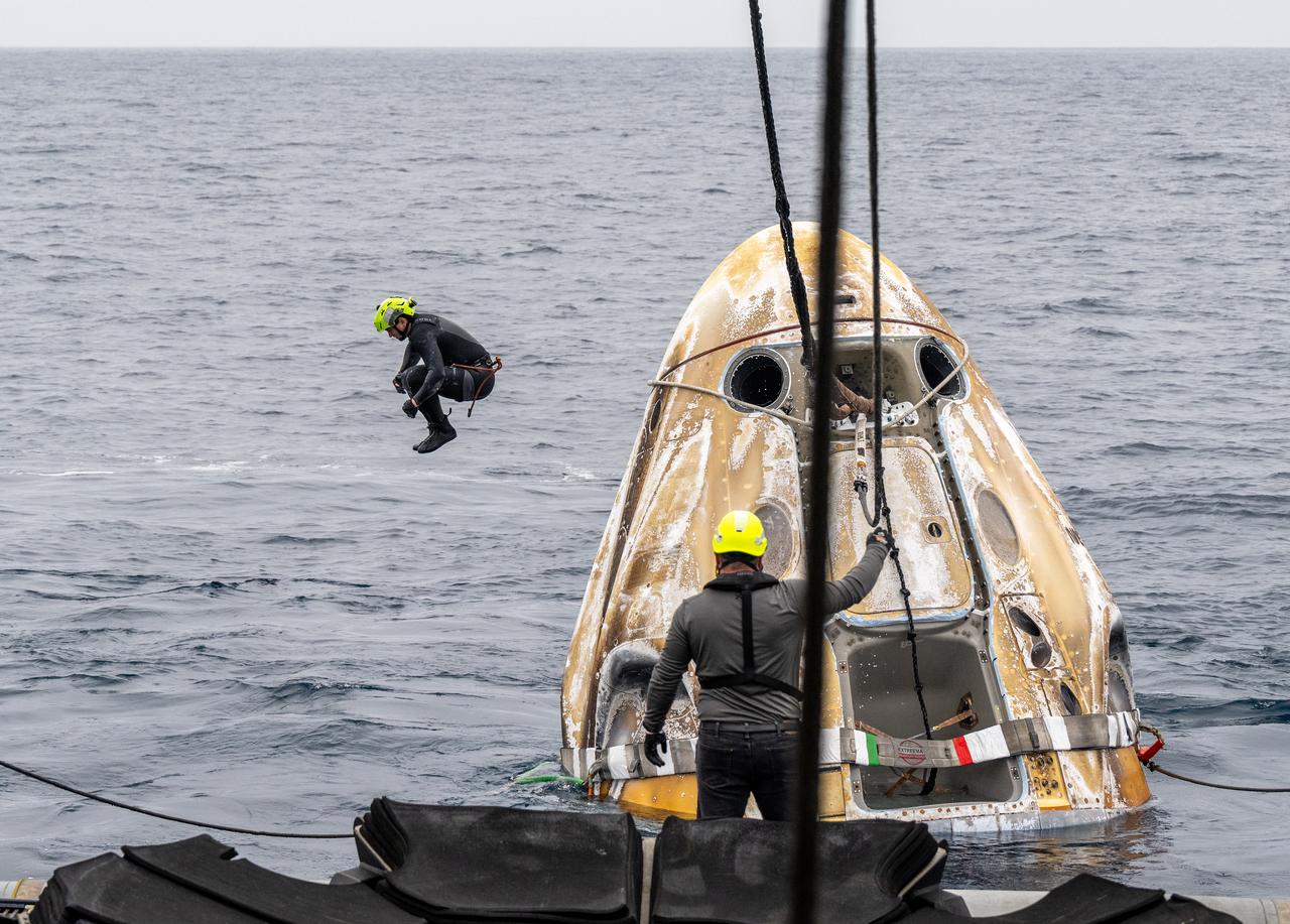 Support teams work around the SpaceX Dragon Endurance spacecraft shortly after it landed with NASA astronauts Anne McClain and Nichole Ayers, JAXA (Japan Aerospace Exploration Agency) astronaut Takuya Onishi, and Roscosmos cosmonaut Kirill Peskov aboard in the Pacific Ocean off the coast of San Diego, Calif., Saturday, Aug. 9,2025. McClain, Ayers, Onishi, and Peskov are returning after 147 days in space as part of Expedition 73 aboard the International Space Station. Photo Credit: (NASA/Keegan Barber)