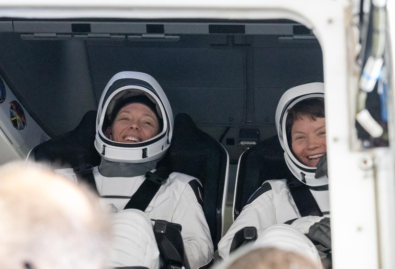 NASA astronaut Nichole Ayers, left, and Anne McClain, right, are seen inside the SpaceX Dragon Endurance spacecraft onboard the SpaceX recovery ship SHANNON after they, JAXA (Japan Aerospace Exploration Agency) astronaut Takuya Onishi, and Roscosmos cosmonaut Kirill Peskov landed in the Pacific Ocean off the coast of San Diego, Calif., Saturday, Aug. 9, 2025. McClain, Ayers, Onishi, and Peskov are returning after 147 days in space as part of Expedition 73 aboard the International Space Station. Photo Credit: (NASA/Keegan Barber)