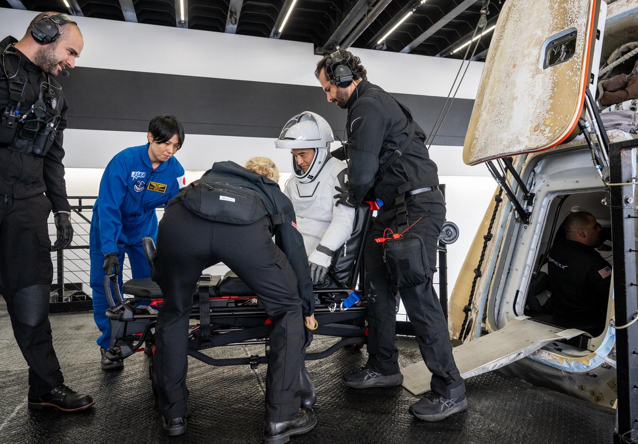 JAXA (Japan Aerospace Exploration Agency) astronaut Takuya Onishi is helped out of the SpaceX Dragon Endurance spacecraft onboard the SpaceX recovery ship SHANNON after he, NASA astronauts Nichole Ayers, Anne McClain, and Roscosmos cosmonaut Kirill Peskov landed in the Pacific Ocean off the coast of San Diego, Calif., Saturday, Aug. 9, 2025. McClain, Ayers, Onishi, and Peskov are returning after 147 days in space as part of Expedition 73 aboard the International Space Station. Photo Credit: (NASA/Keegan Barber)