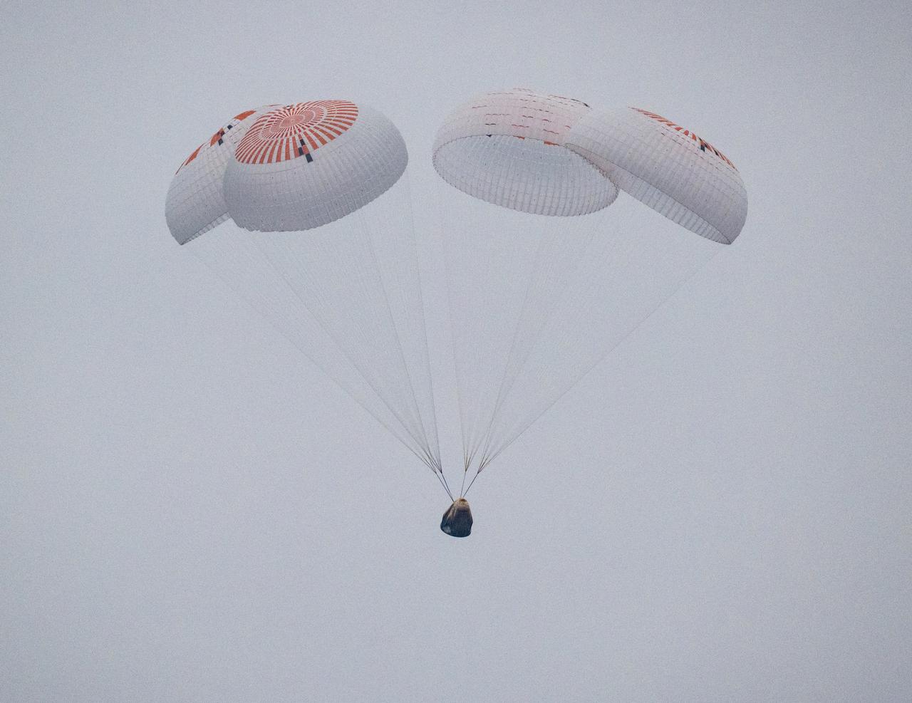The SpaceX Crew Dragon Endurance spacecraft is seen as it lands with NASA astronauts Anne McClain and Nichole Ayers, JAXA (Japan Aerospace Exploration Agency) astronaut Takuya Onishi, and Roscosmos cosmonaut Kirill Peskov aboard in the Pacific Ocean off the coast of San Diego, Calif., Saturday, Aug. 9, 2025. McClain, Ayers, Onishi, and Peskov are returning after 147 days in space as part of Expedition 73 aboard the International Space Station. Photo Credit: (NASA/Keegan Barber)